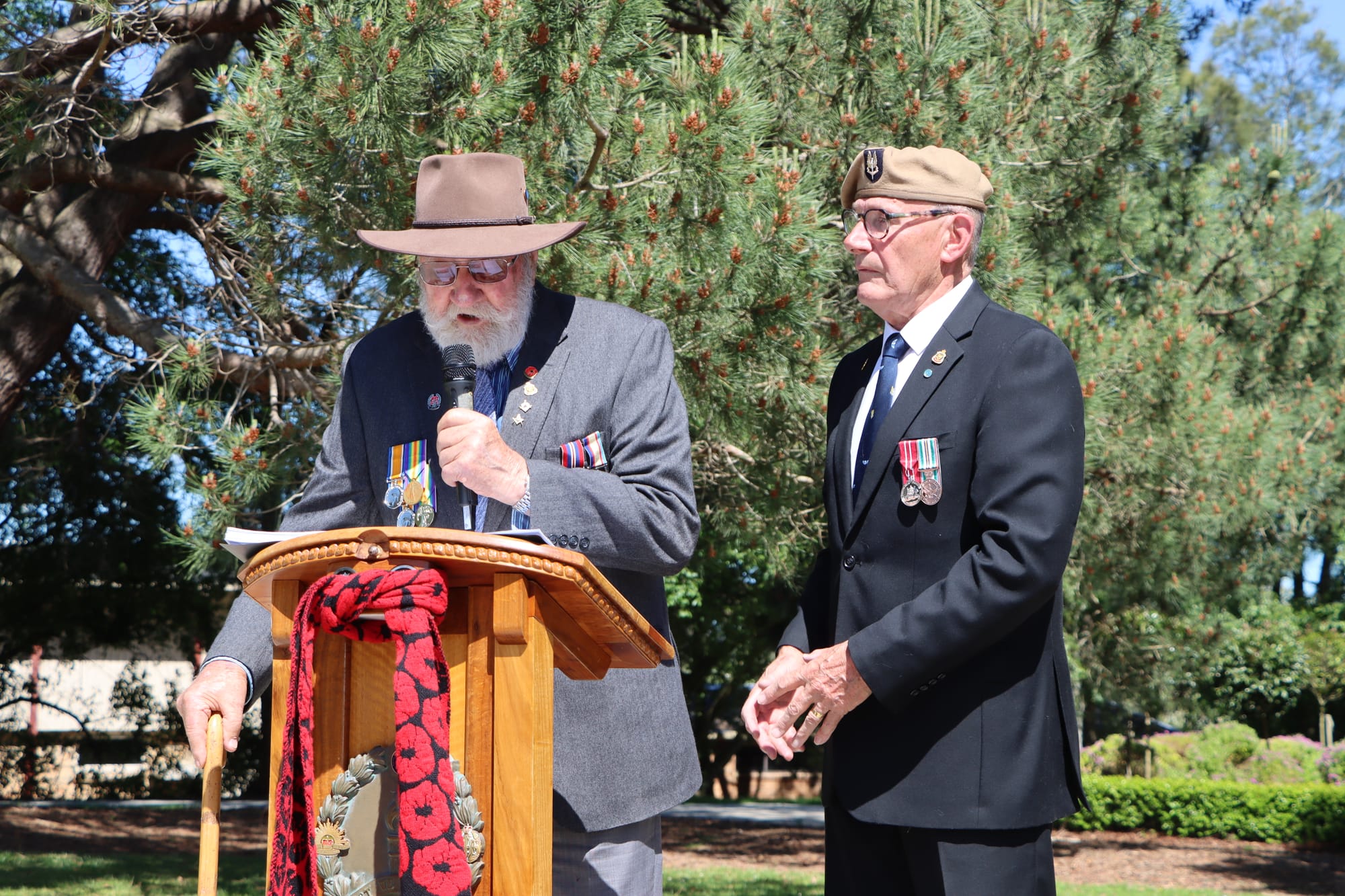 Hugh Hendry recites the famous poem about Flanders Fields, while Korumburra RSL president David Jackson looks on.