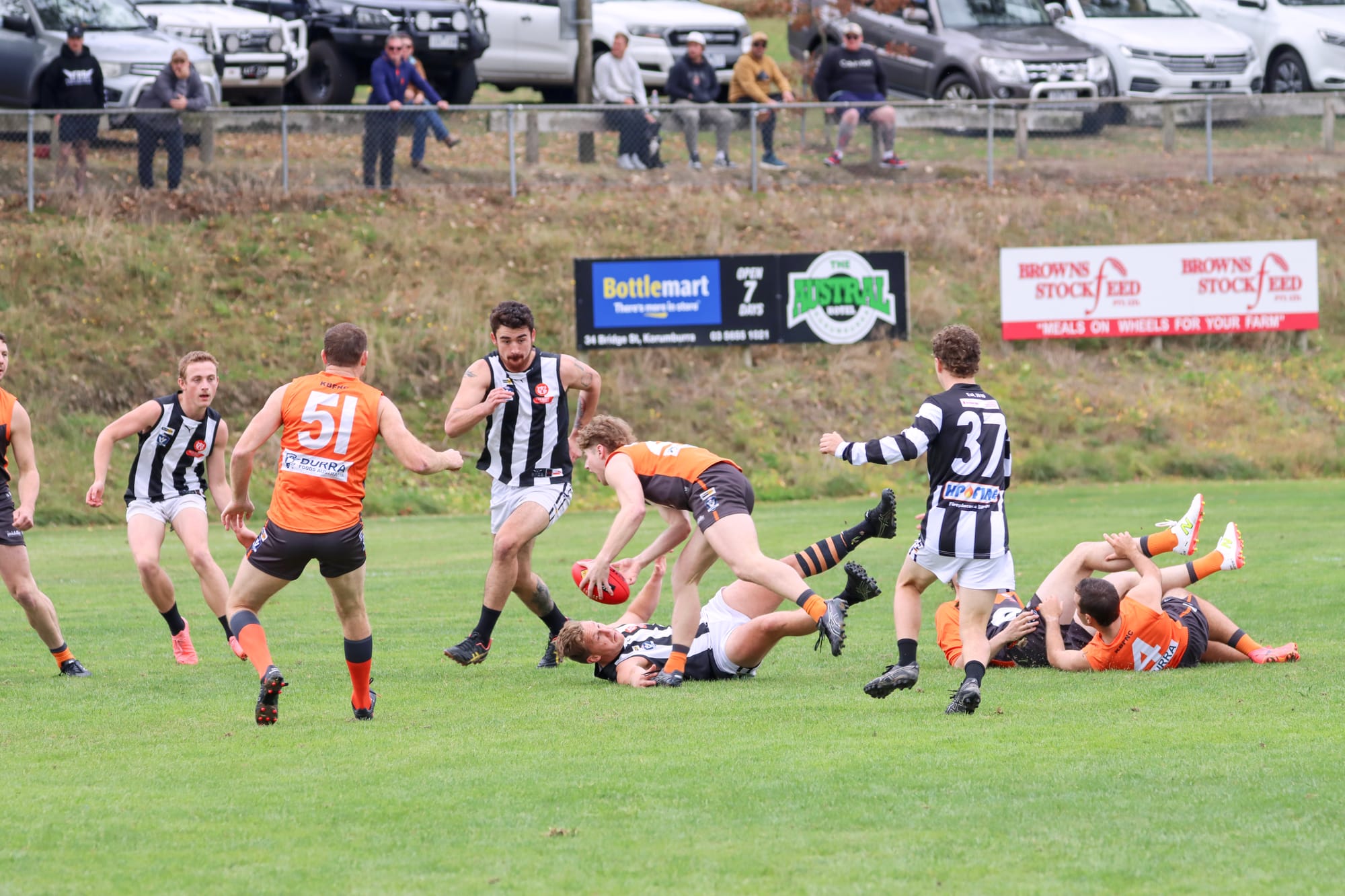 Korumburra-Bena and Dalyston players compete during the first quarter. A29_1725
