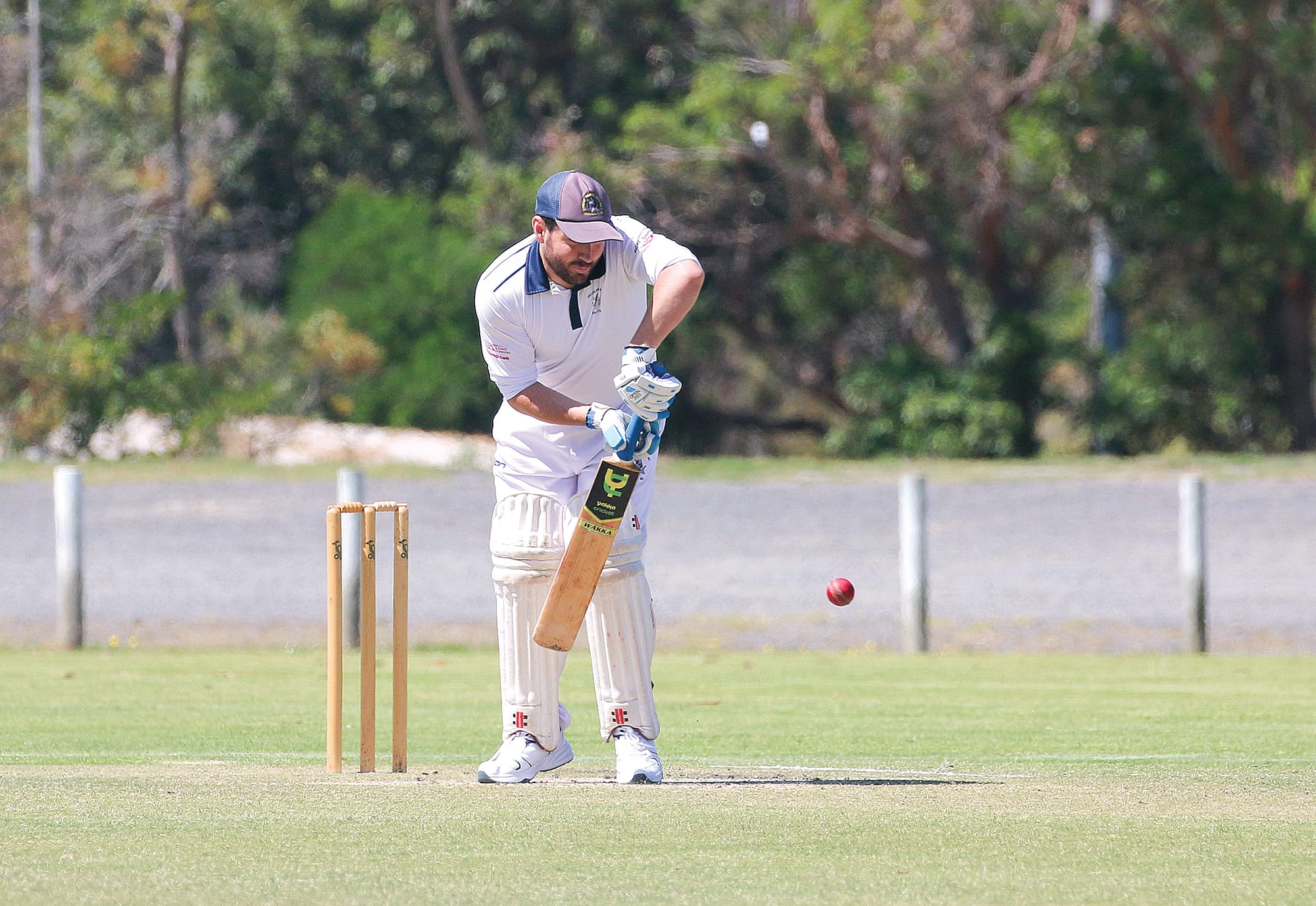 Phillip Island’s Andrew Tolley focuses on an incoming ball.