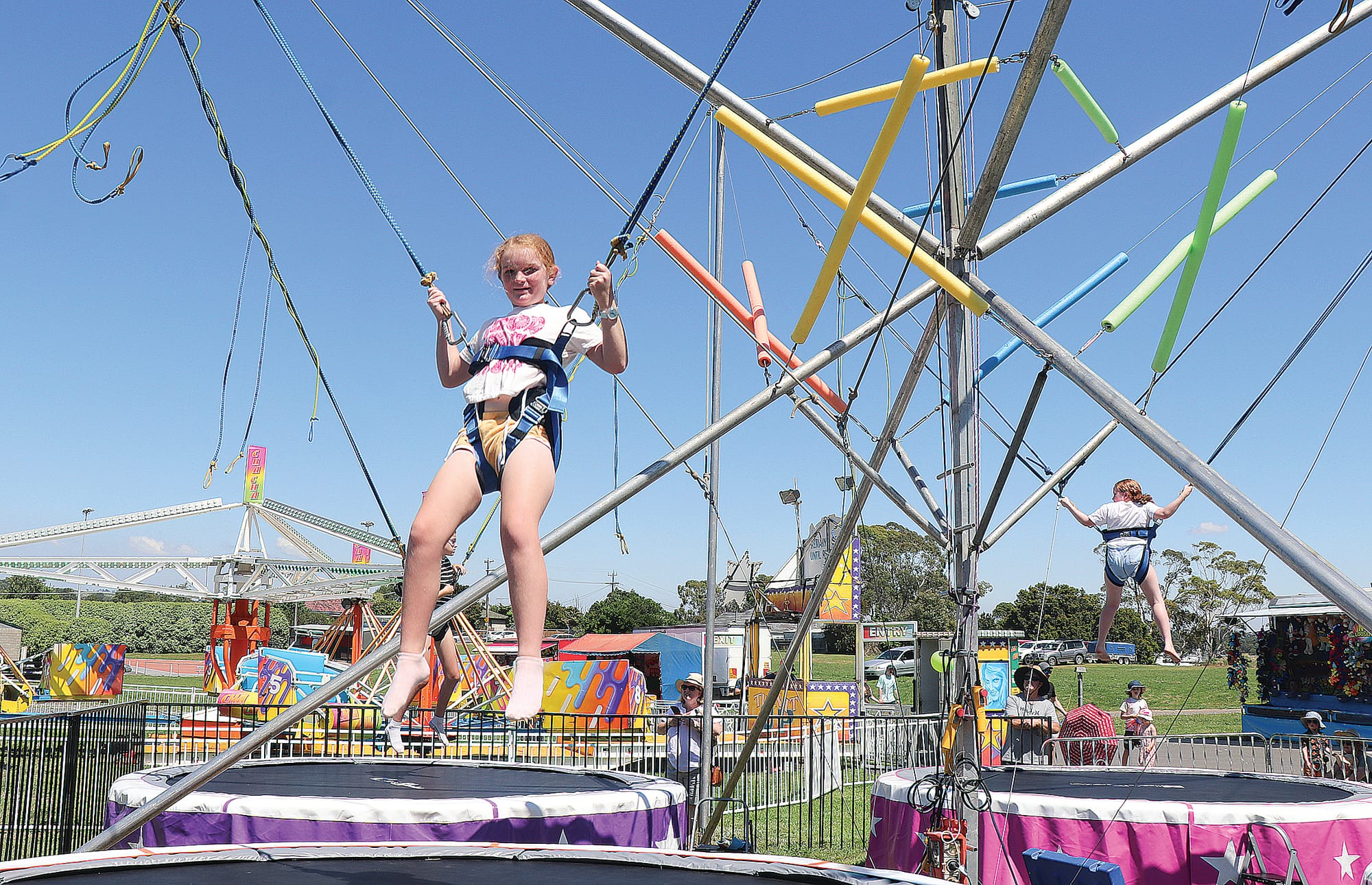 Lulu enjoyed the entertainment at the Korumburra Show, flying high on the Taylors Amusements super high jump bungies.