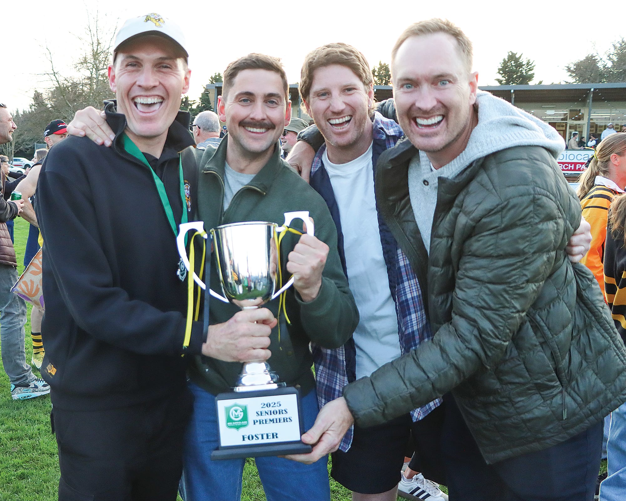 Foster coach Sam Davies delights in Premiership success with Jake Pilkington, Fred Cooper and Dr Tim Blake. A39_3725
