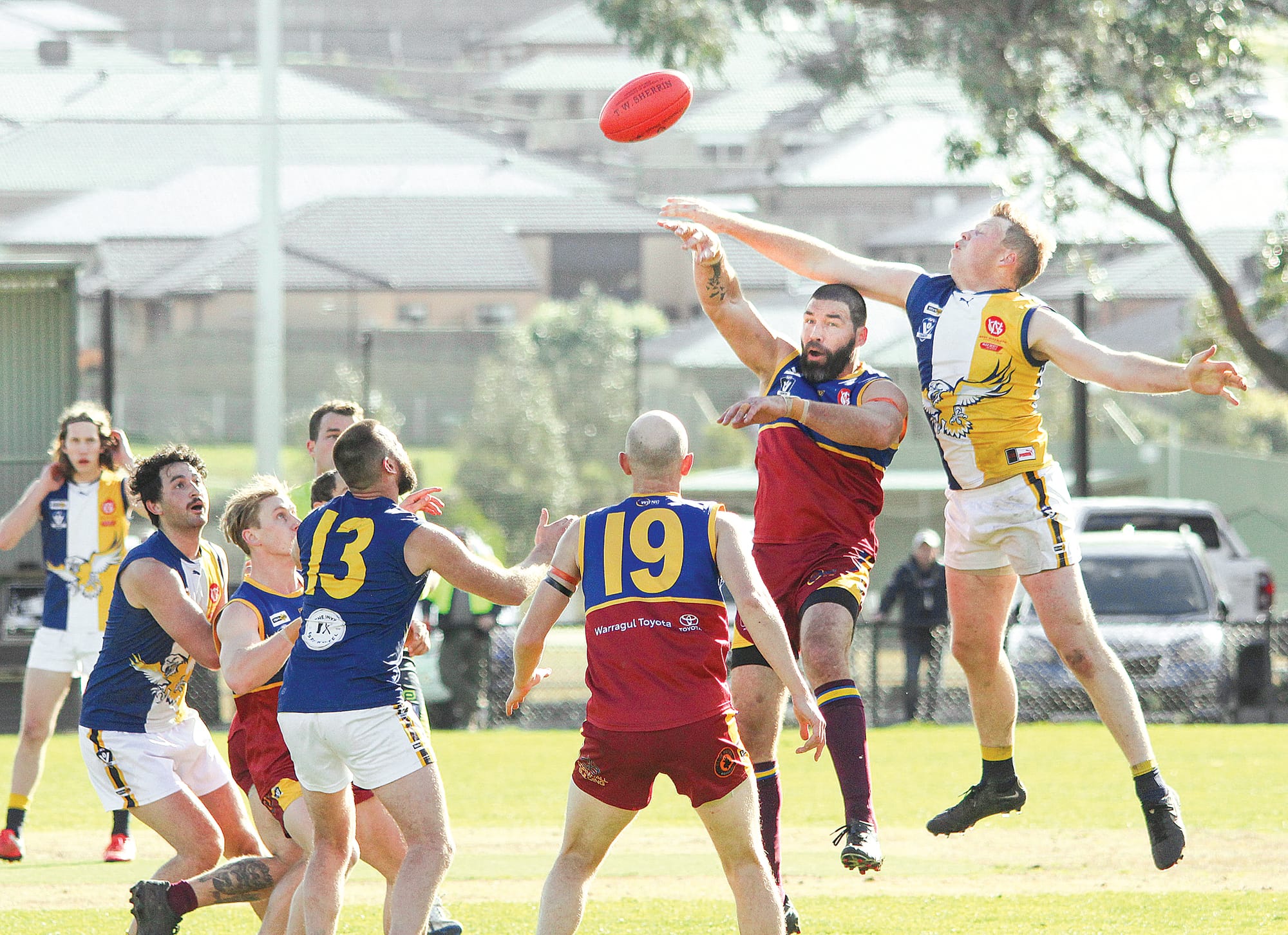 The rucks contest the ball in the centre of Western Park. 