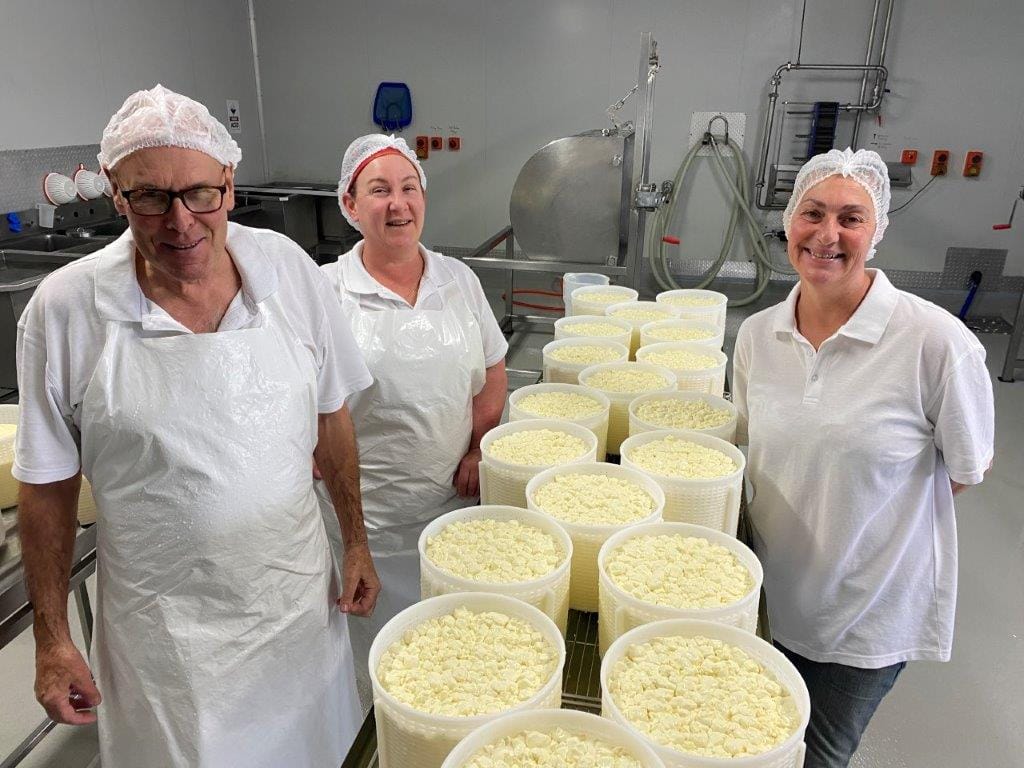 Master cheesemaker Barry Charlton is passing on the experience of a lifetime to Berry Creek cheesemakers Kathryn Brown and Georgina Furjes with another batch of Mossvale Blue cheese.