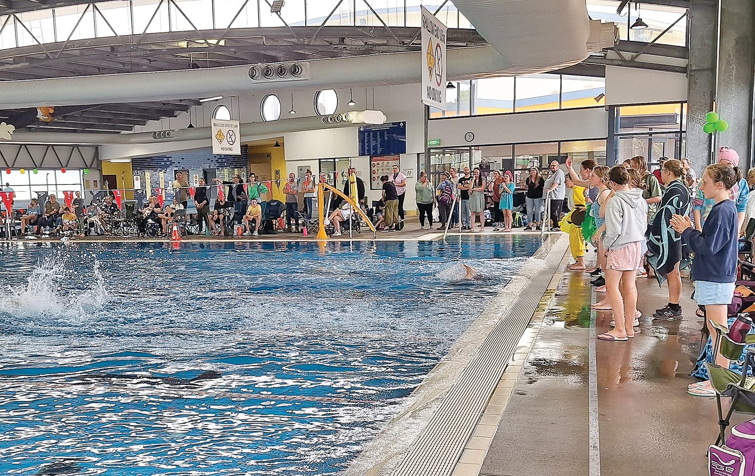 Spectators cheered on competitors in the relay race at Leongatha Splash.