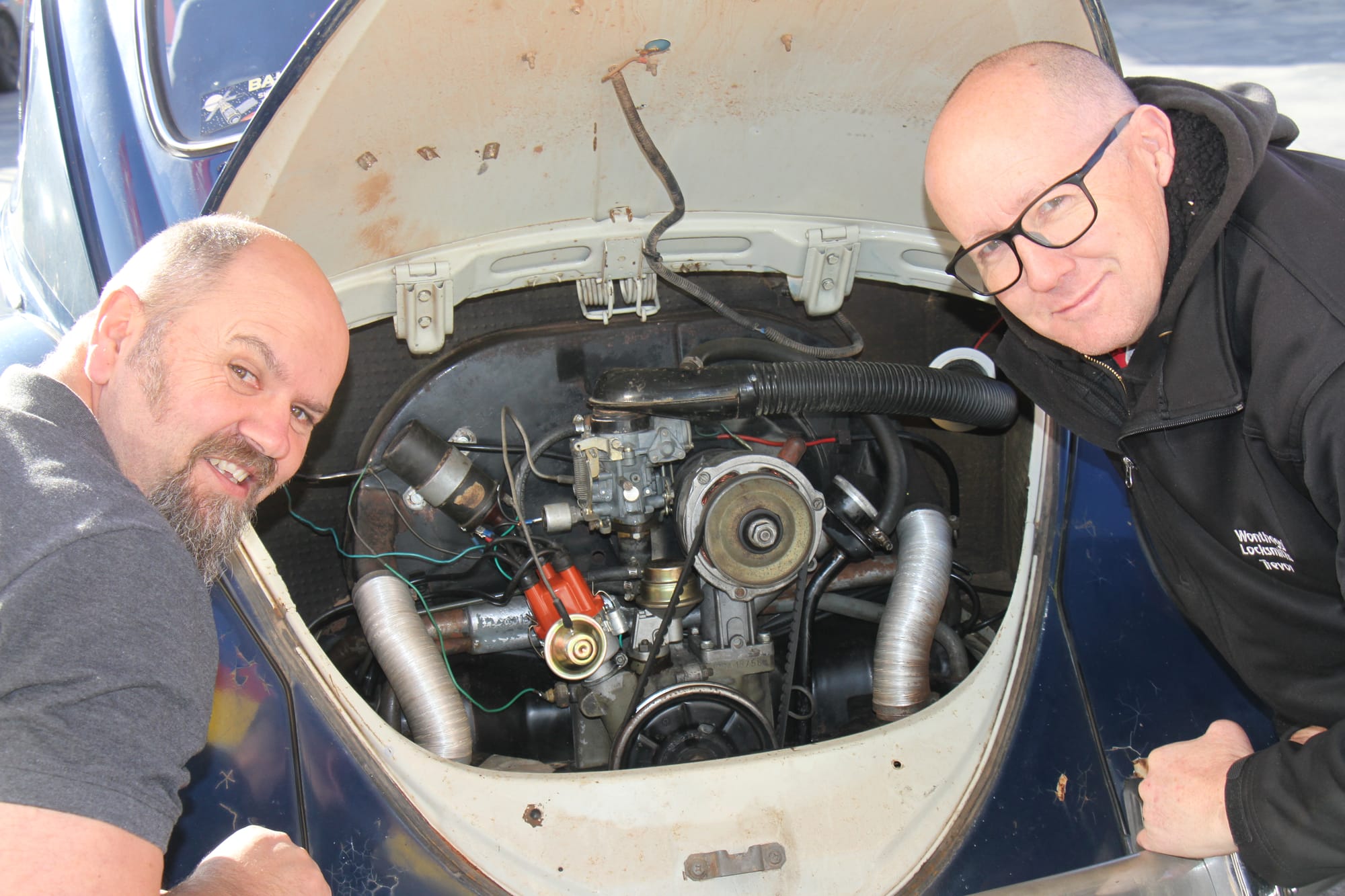 Mystery Rally co-drivers Nathan Leversha and Trevor Heawood looking over the updated 1600 powerplant of their ’65 Volkswagen Beetle ‘Skille’. B40_2625