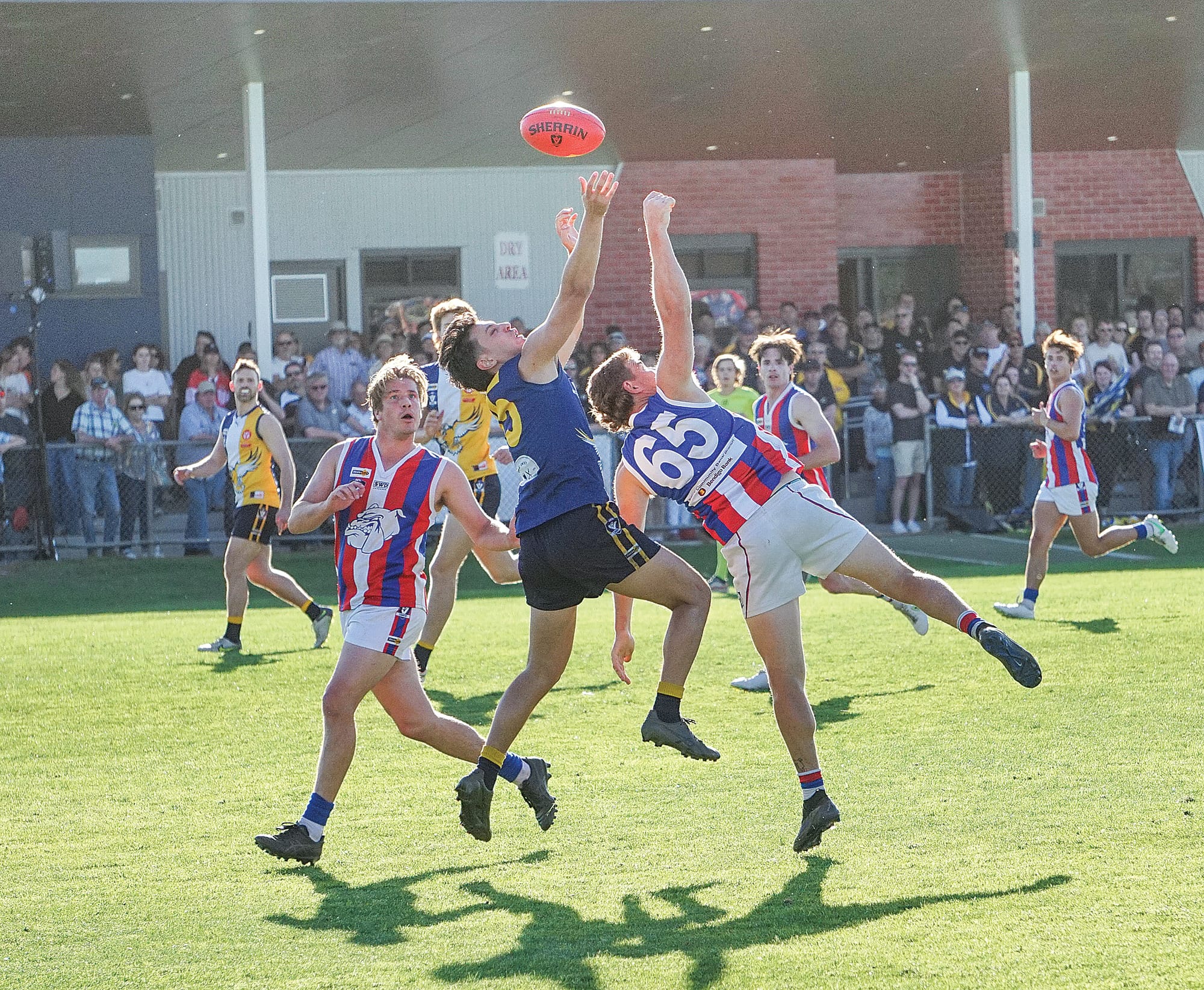 Phillip Island’s Mark&nbsp;Griffin just misses as Inverloch-Kongwak’s Taite Cumming looks to secure the mark. Ns243823