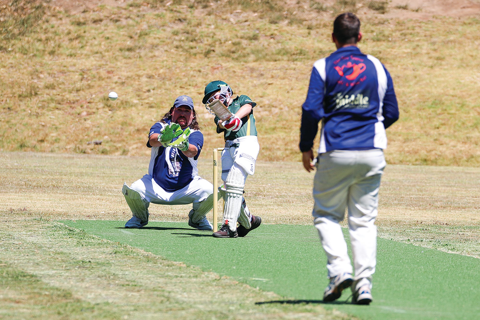 Town’s Callum Smith launches into a powerful drive. C45_0525