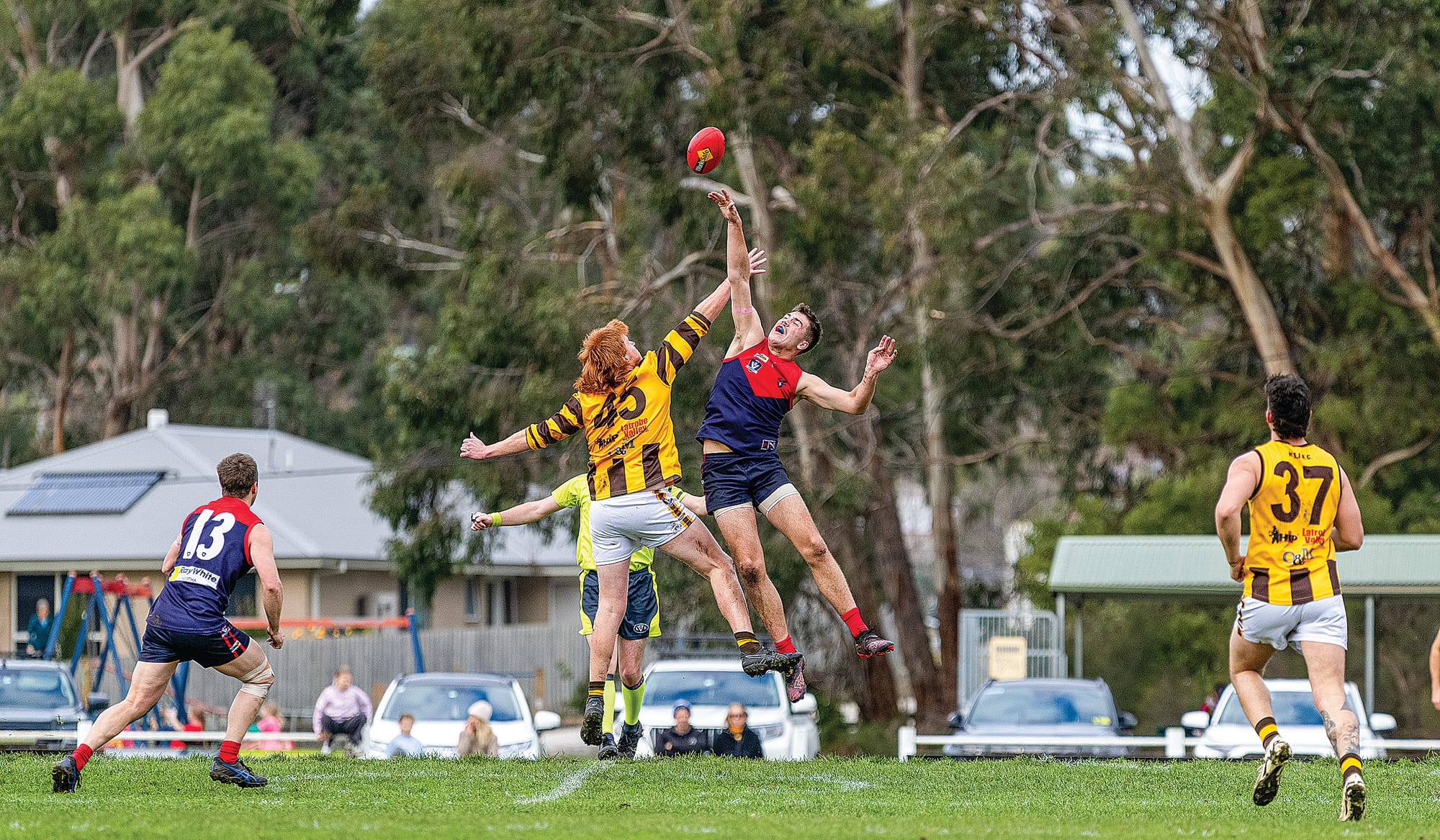 Burke VanderZalm leaps in the ruck. Photo: Bec Casey Sports Photography.