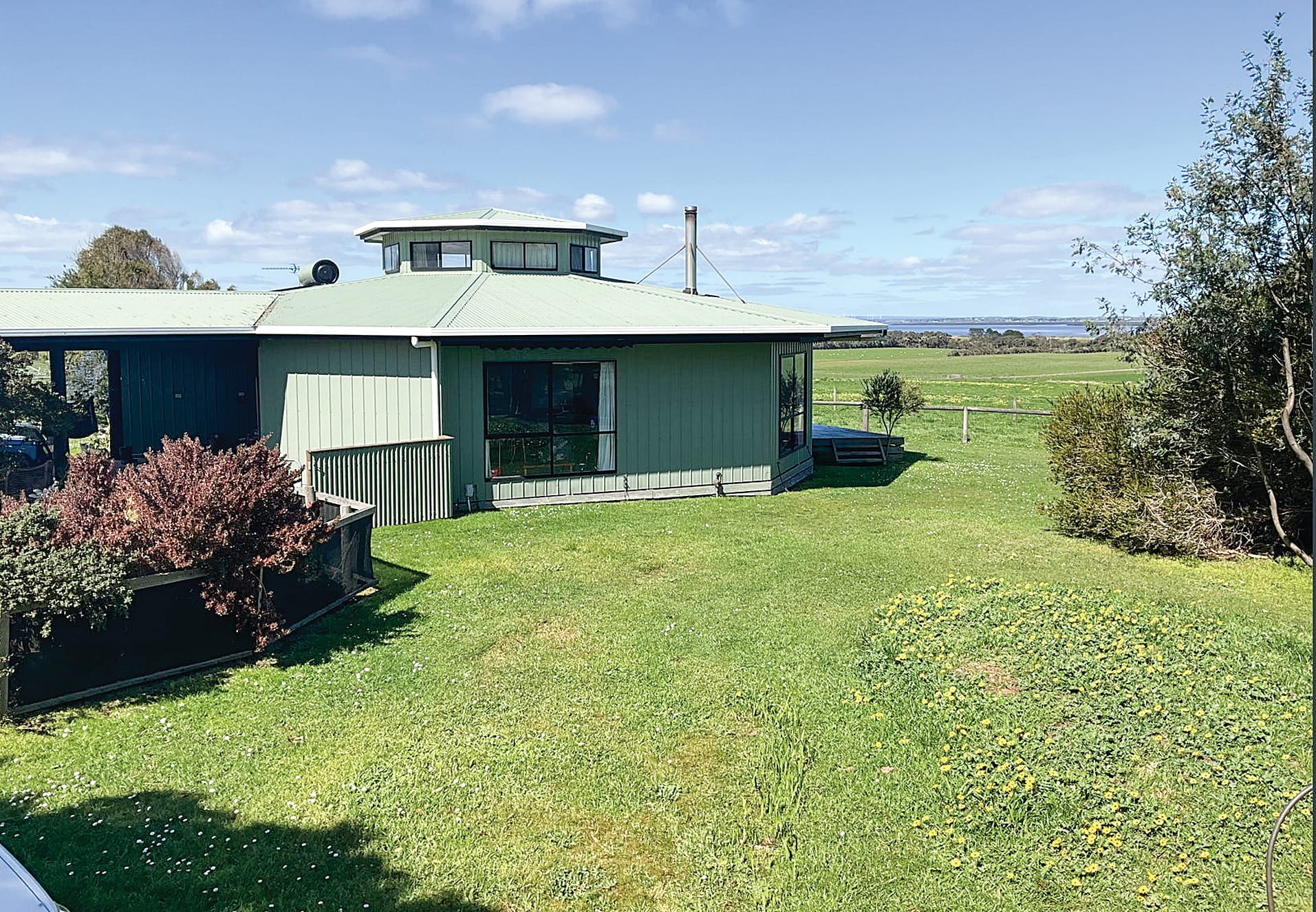Elevated farmlet with sweeping water views