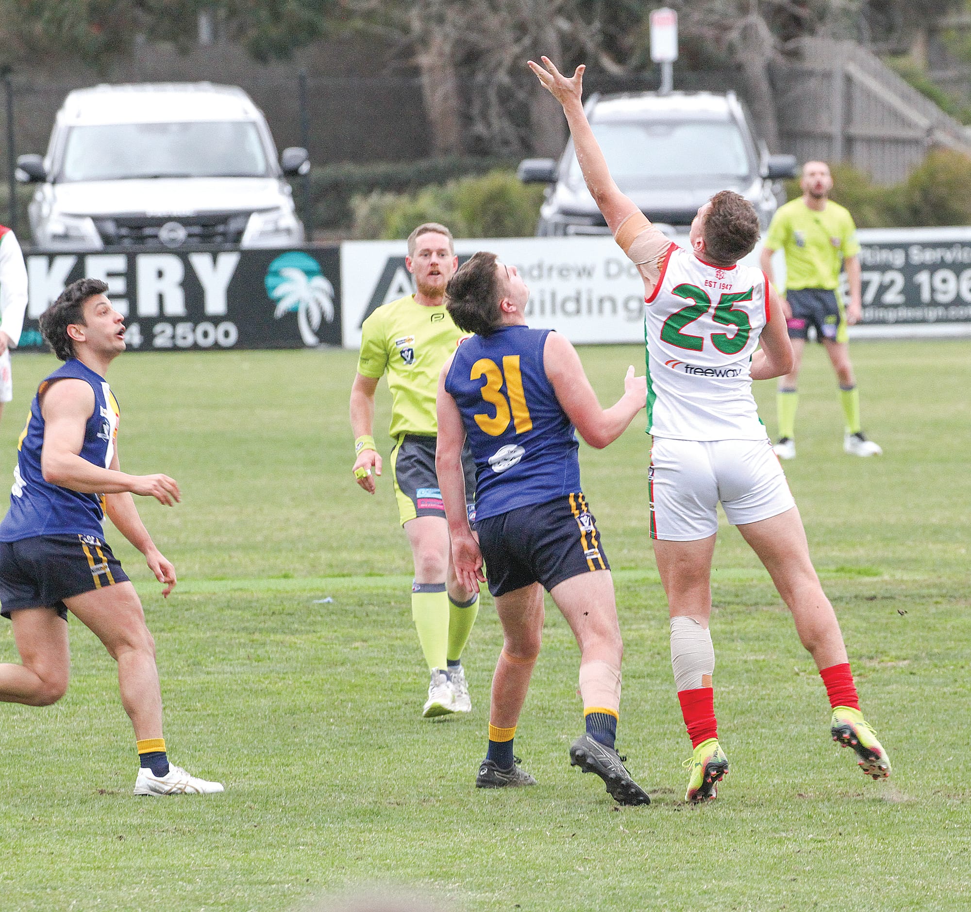 Tooradin Dalmore’s Jack Flannery outreaches Sea Eagles’ Logan Downe. B65_2925
