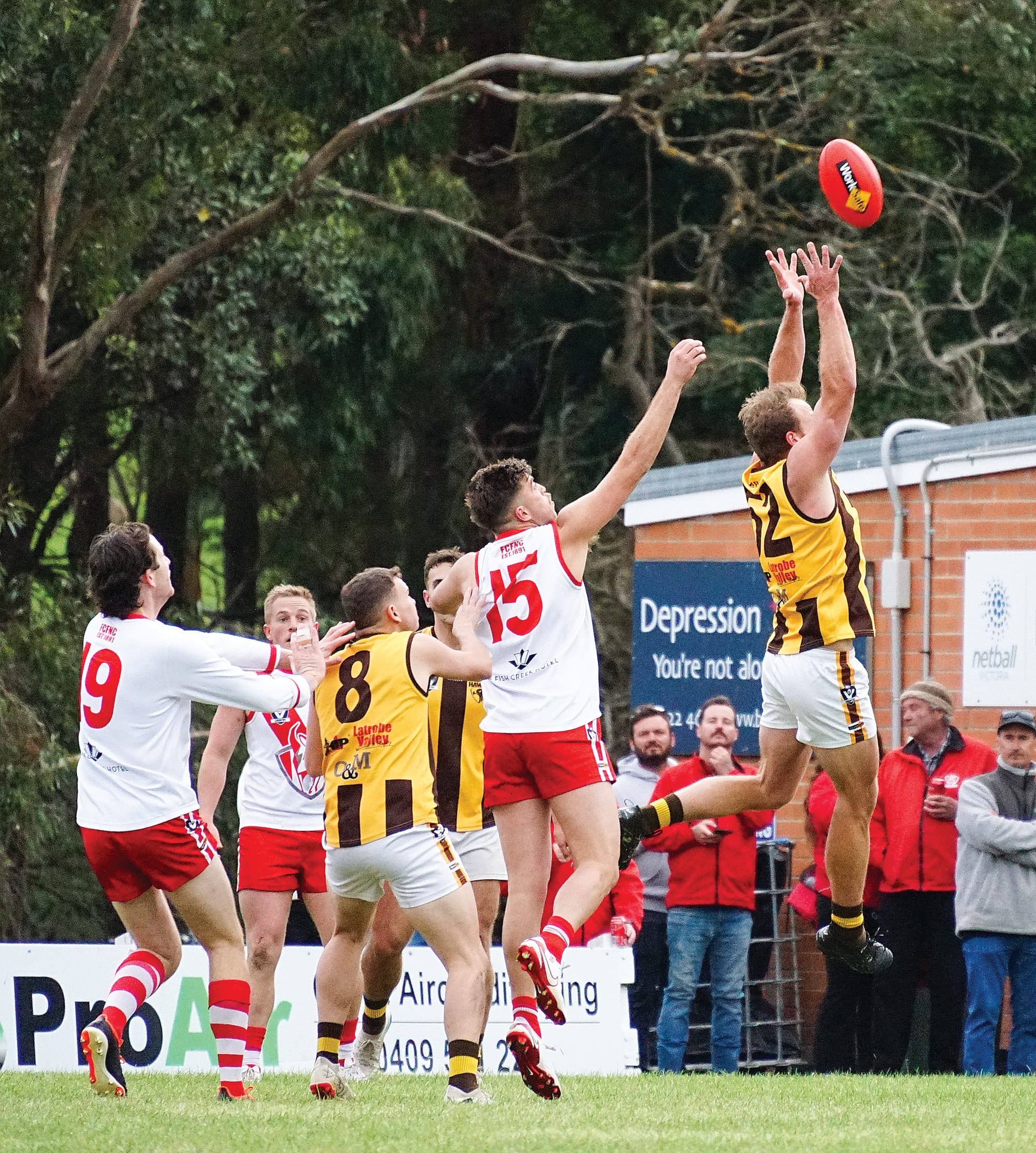 Fish Creek’s Jacob&nbsp;Lamers looks to upset Morwell East’s mark. Ns38_2025