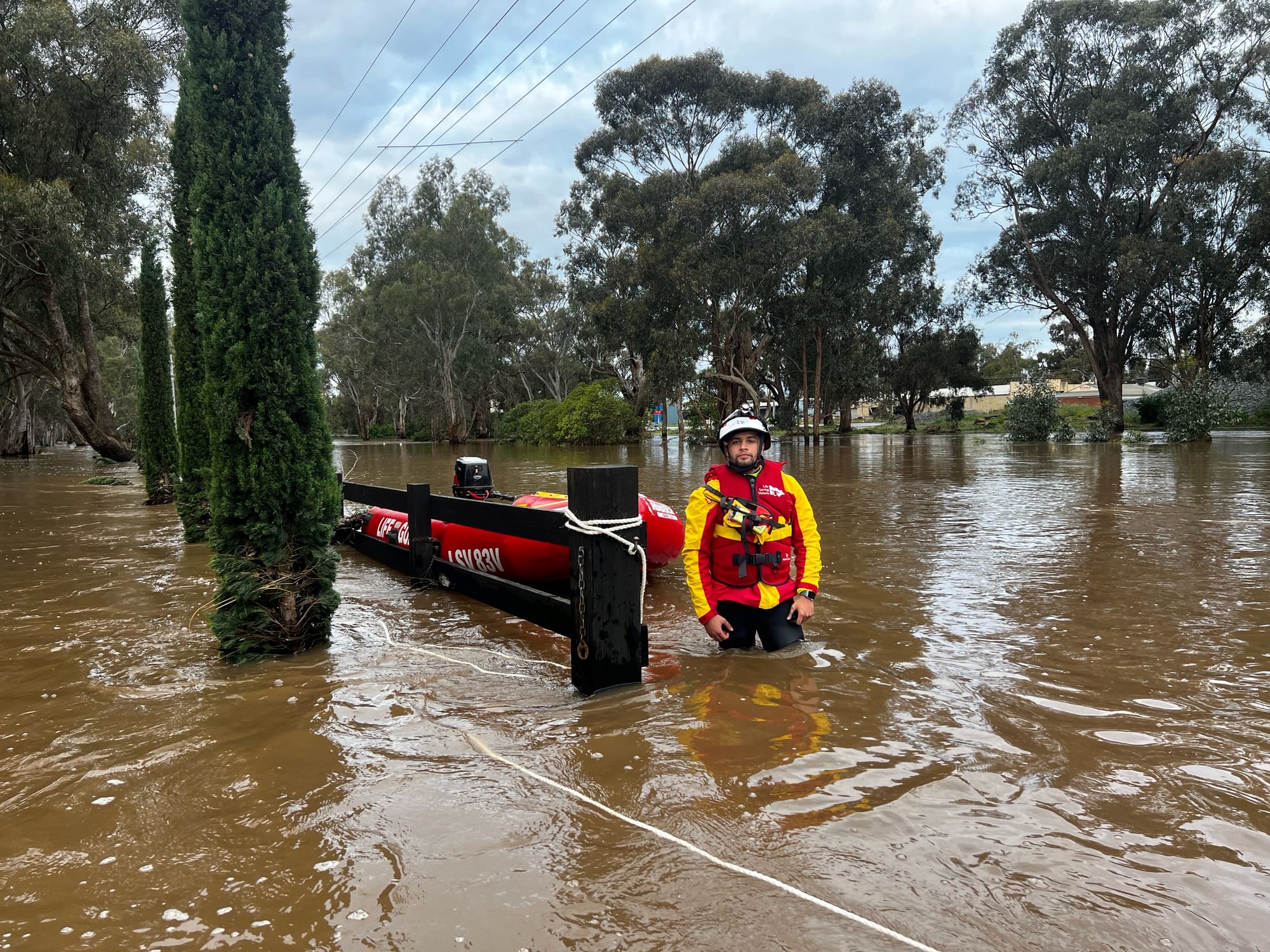 Nicholas Perera shows the extent of flooding at Rochester.
