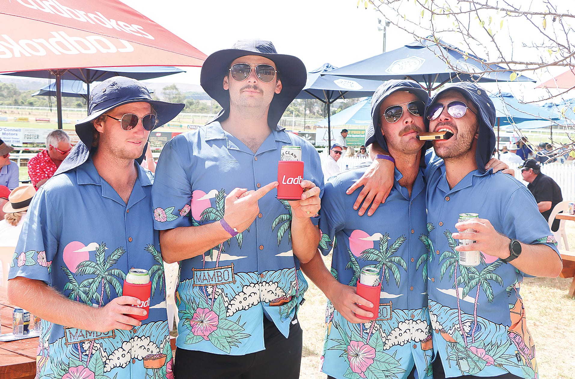 Paul Speed, Allan McLean, Koby Brann and Peter Little enjoying the festivities before their fashions on the field appearance. W38_1025