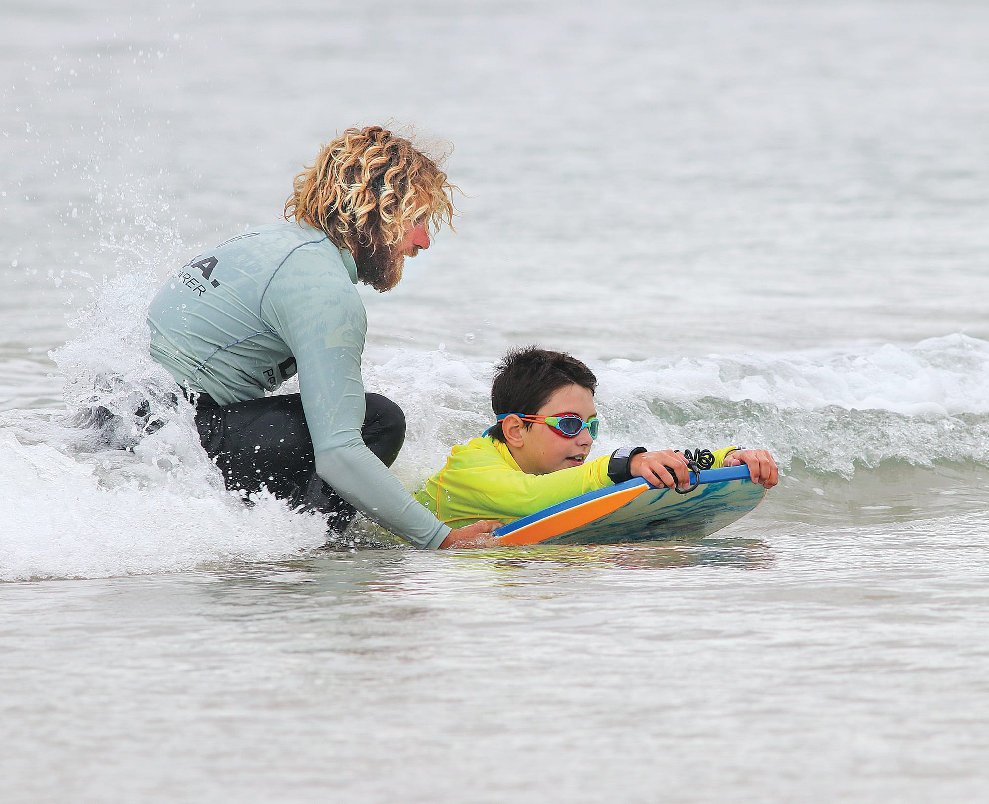 Primary carers enjoy the day as much as the participants, and those of all ages can enjoy the surf safely. Z15_4622 