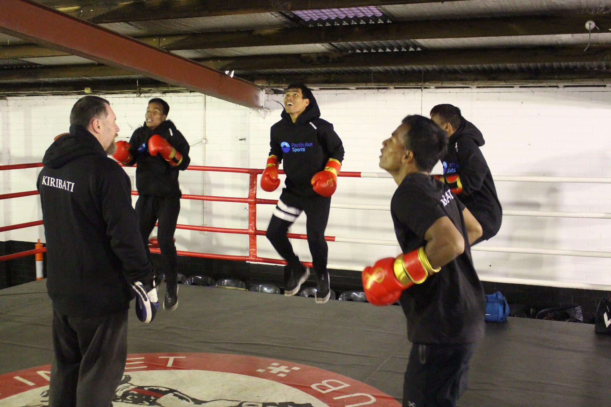 Scott Bindloss and coaches the Kiribati quartet.