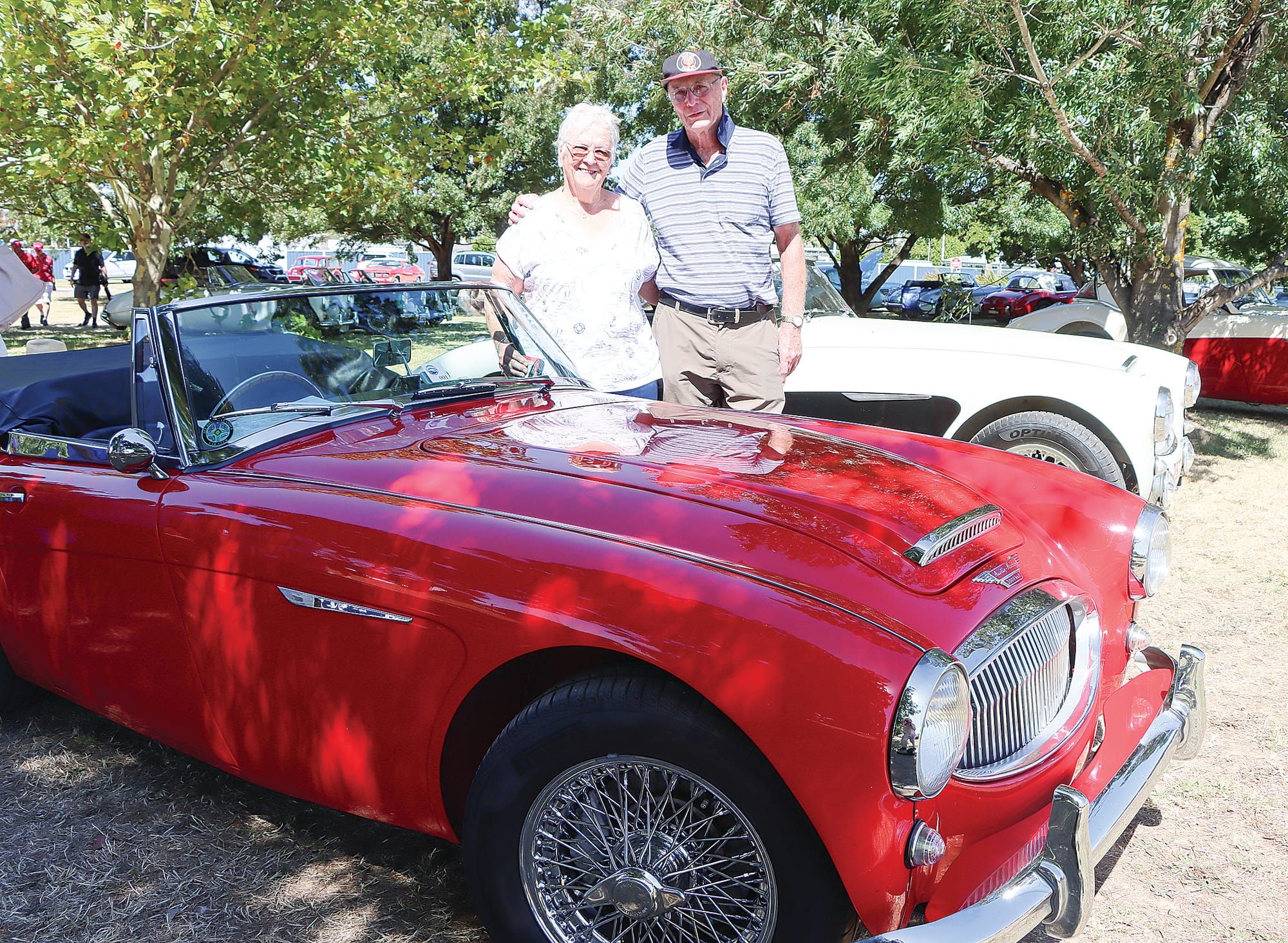 Phyl and Greg Howe with their Ferrari Red 1962 Austin Healey. A02_1025