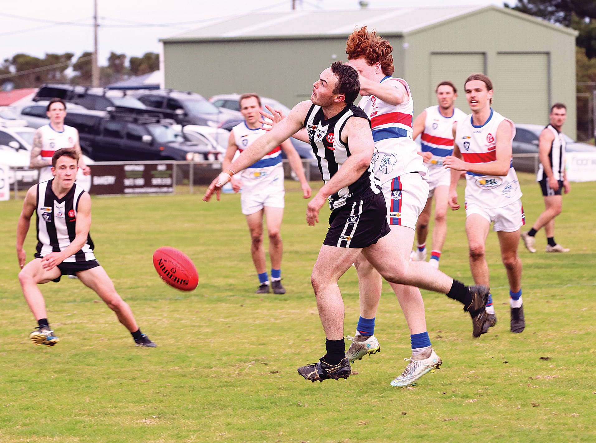 Dalyston’s Hayden Wallis goes up against Phillip Island’s Tarquin McMillan. Z36_3022