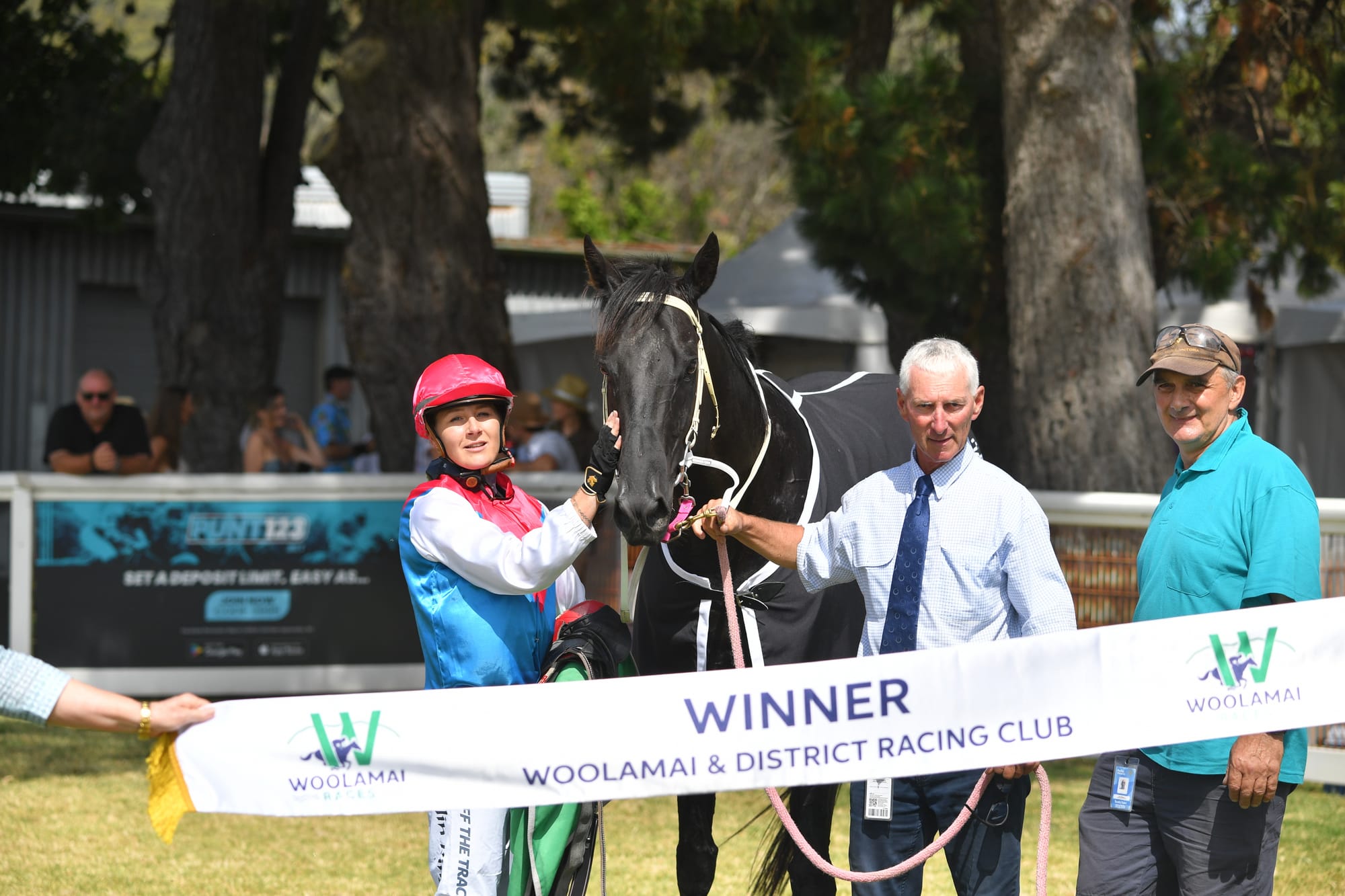 Winner of Woolamai Whirlwind Dr Coto ridden by Caitlin King with trainer Rob Gillahan. Photo credit: Tazzie Eggins Photography. 