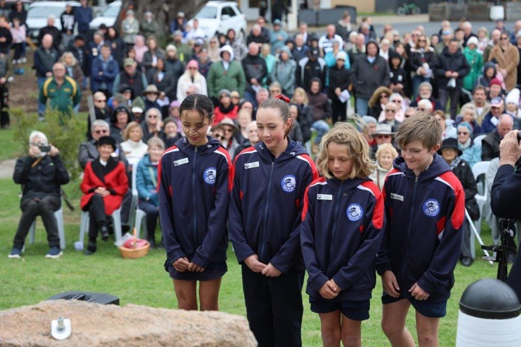 Students from San Remo Primary School Scarlett, Gemma, James and River lay a wreath at the San Remo Anzac Day service.