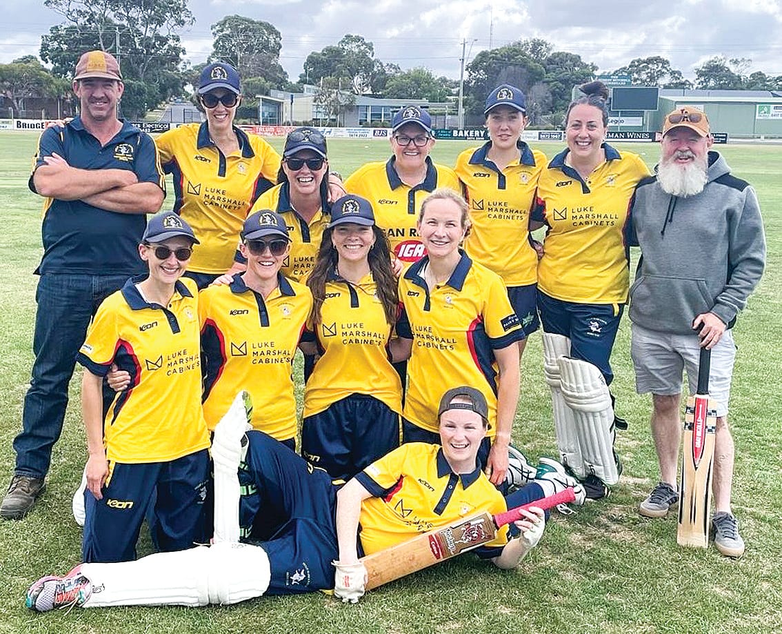 The Phillip Island team will play against Koonwarra/LRSL in the grand final this Sunday. They are pictured with coaches Mick and Dean. 