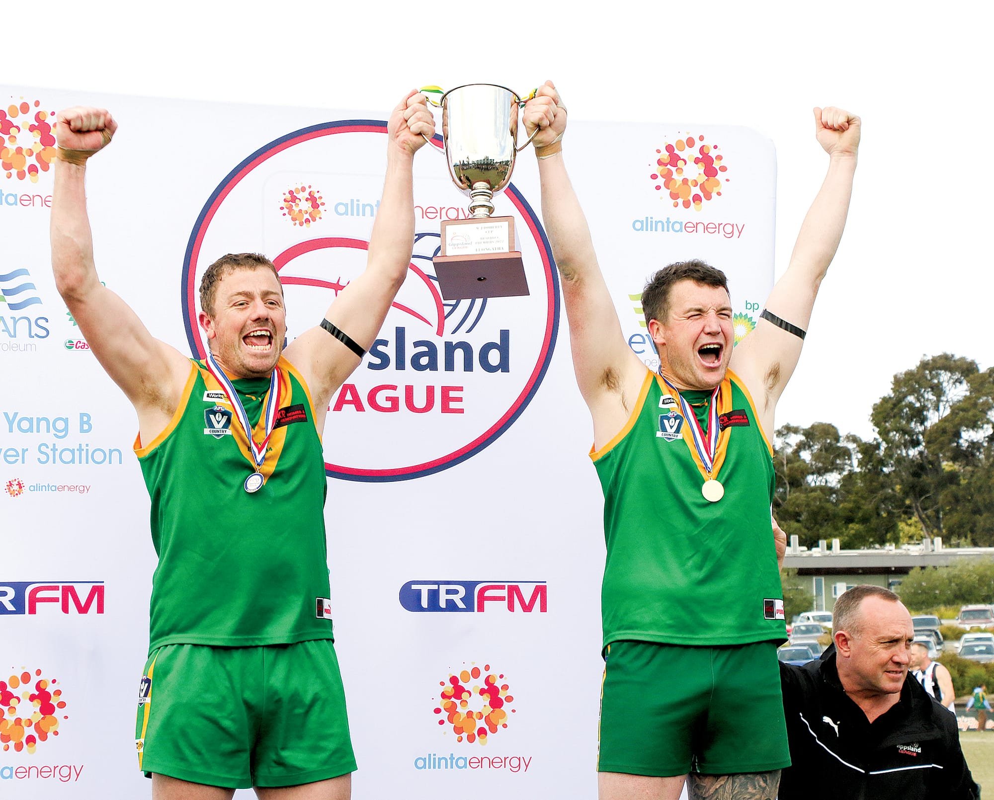 There it is, the captain of the Leongatha Reserves Jake Mackie and coach Rhett Kelly raise the premiership cup at Moe on Saturday.