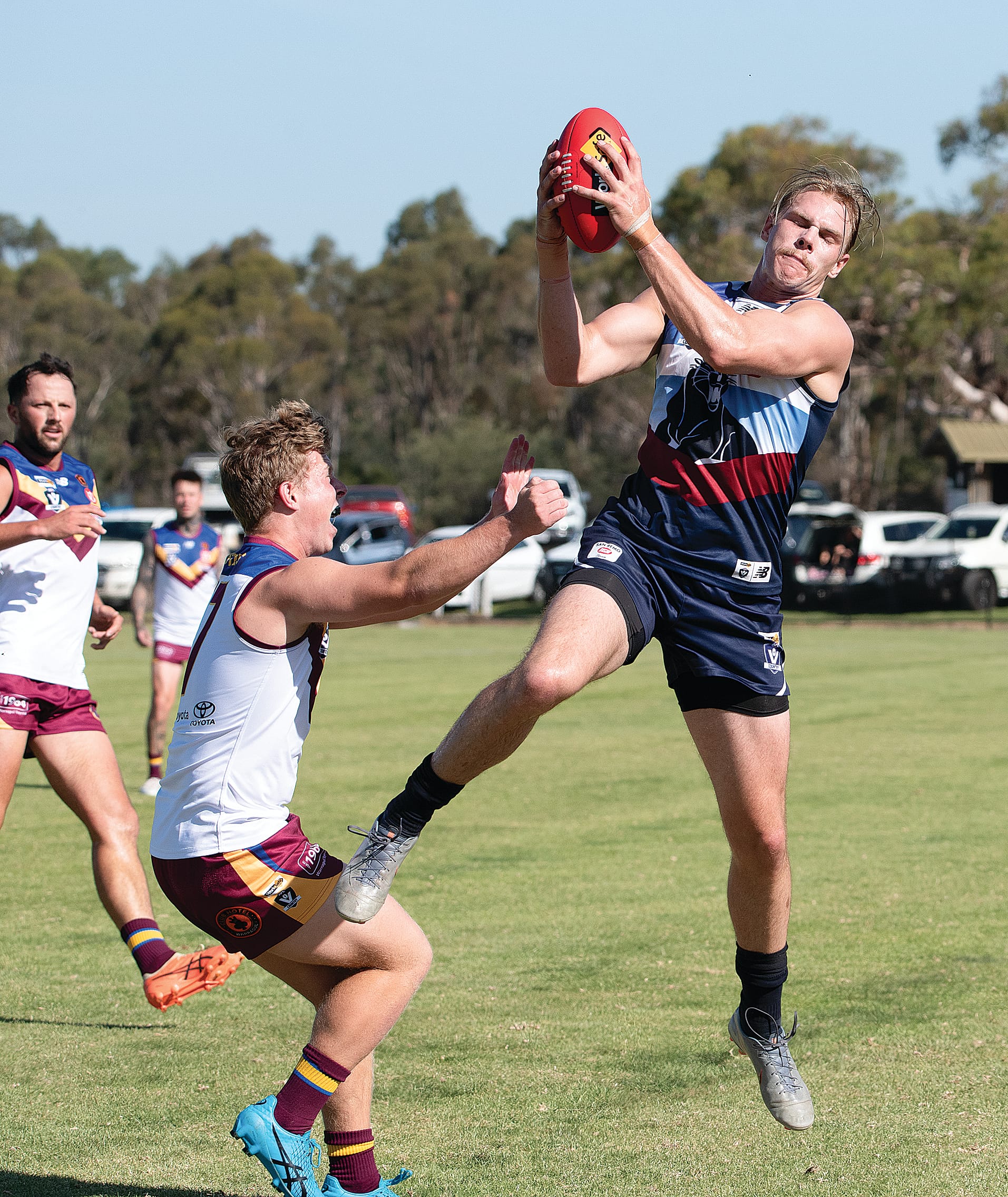 Lochlan Scott takes a strong mark for Kilcunda Bass.
Photos: Anna Carson