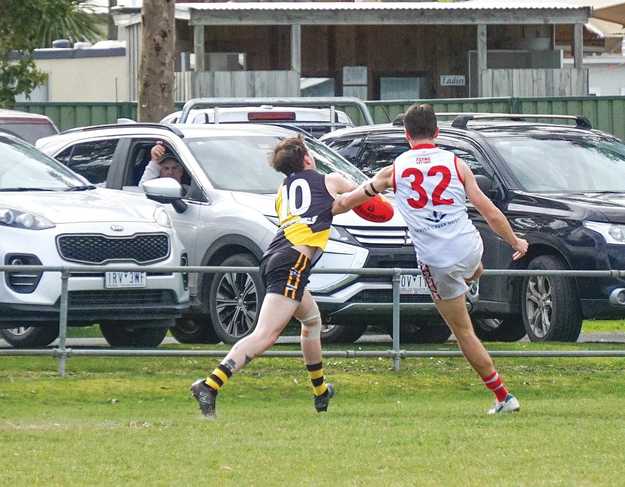 Blaine&nbsp;Coates scores despite the pressure from his Foster opponent Brock Cripps. ns19_3324