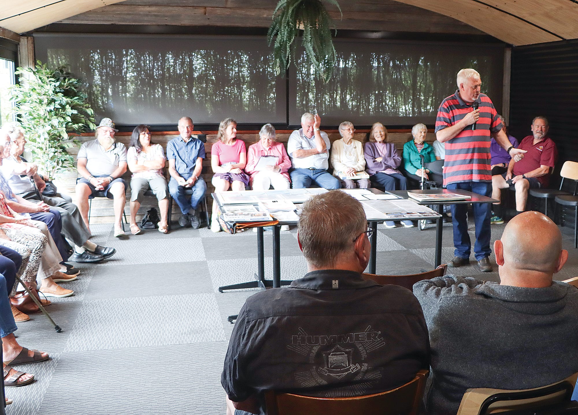 Attendees listen to facilitator David Amor. A07_0925