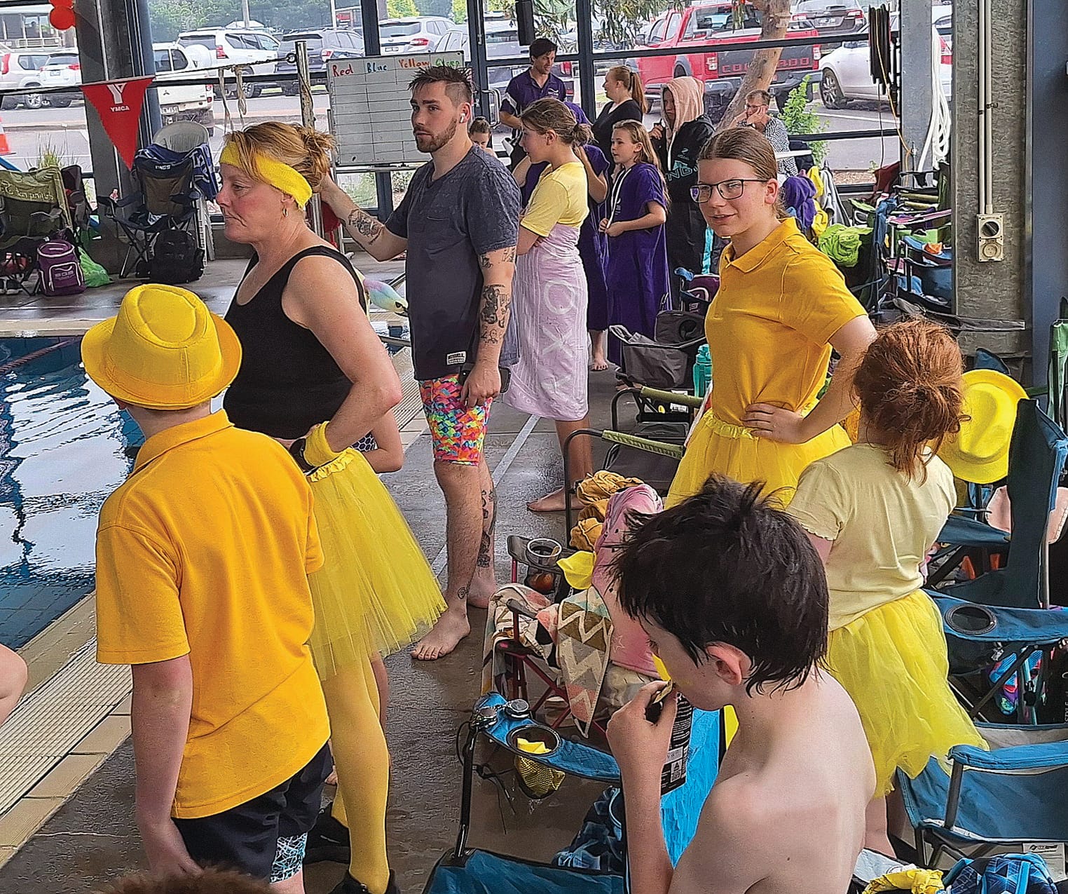 The yellow team showed its support during the relay race.