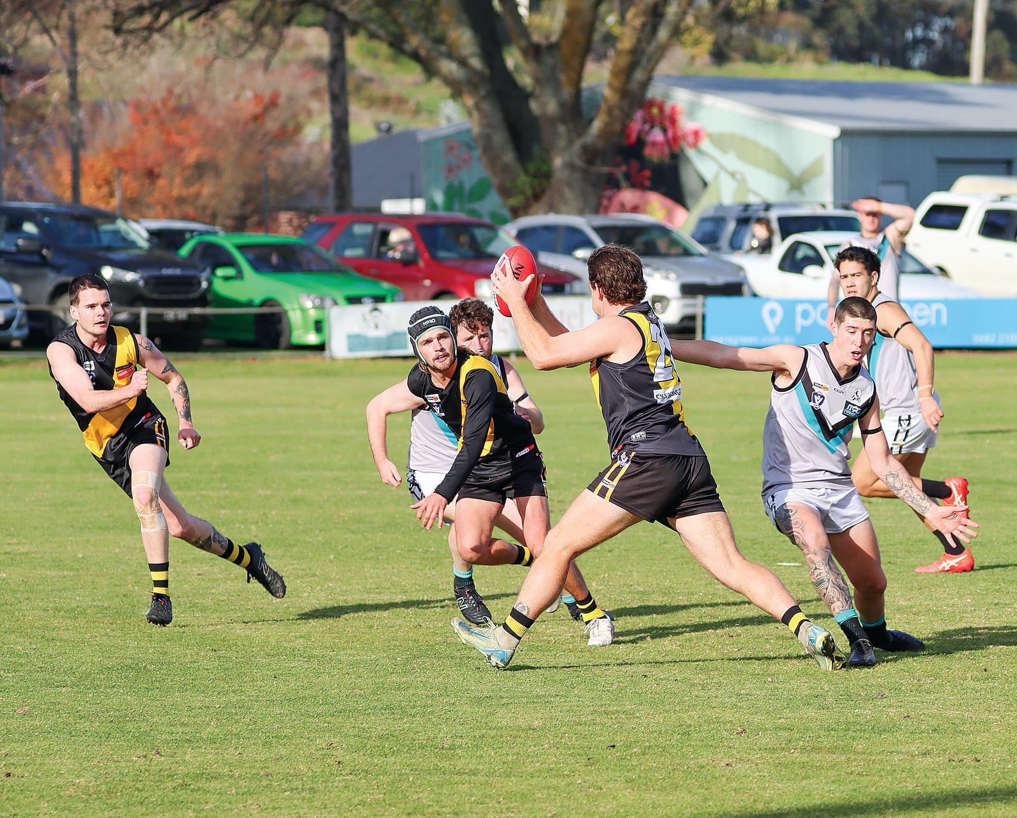 Foster’s Cody Banbury has possession early in the game. A15_2425