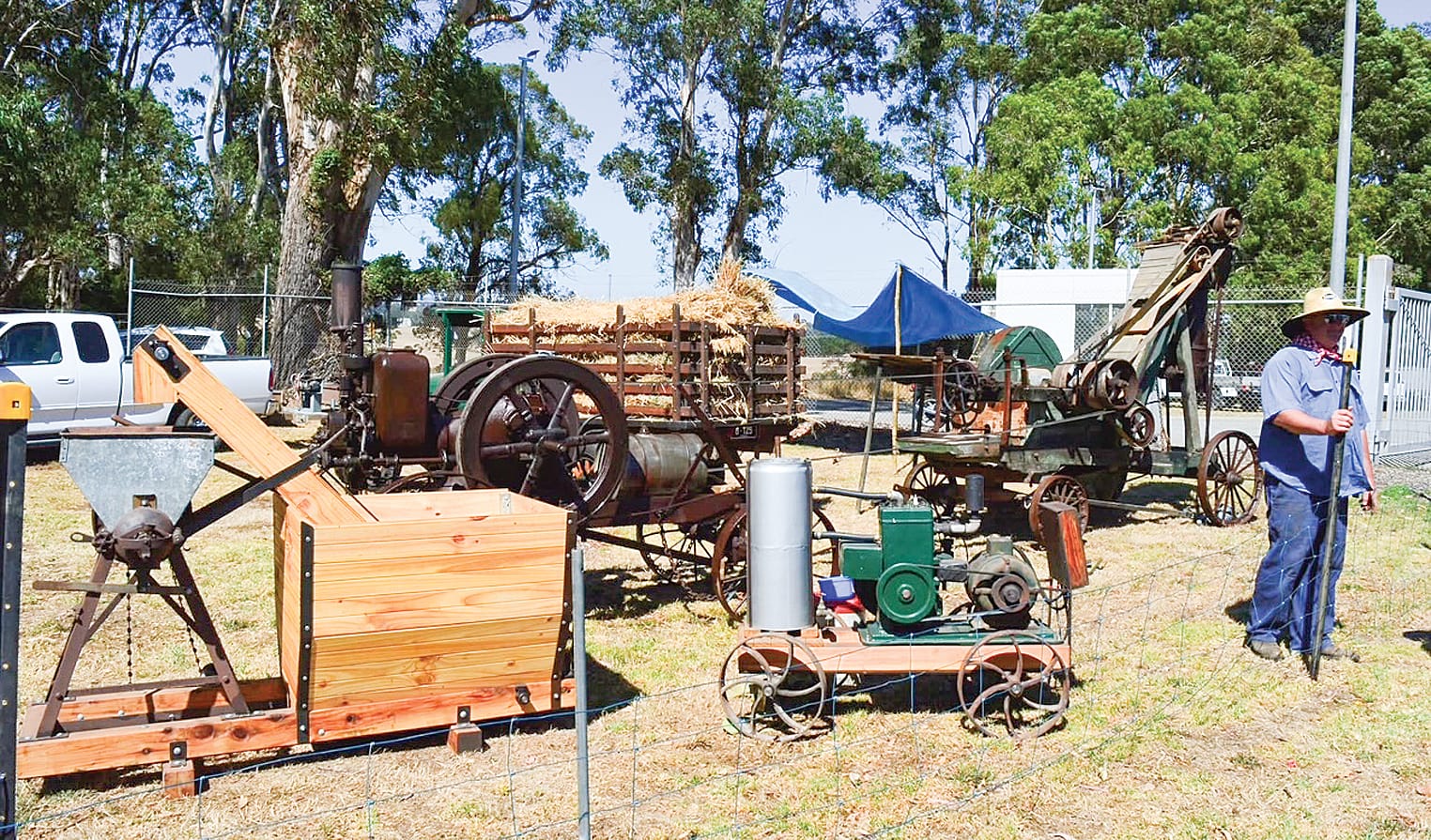 A 1914 Titan tractor with reap and binder pictured with oats harvested. These oats will be cut into chaff for horse feed at the rally. Wheat will also be milled for flour in a new farm-to-plate demonstration.