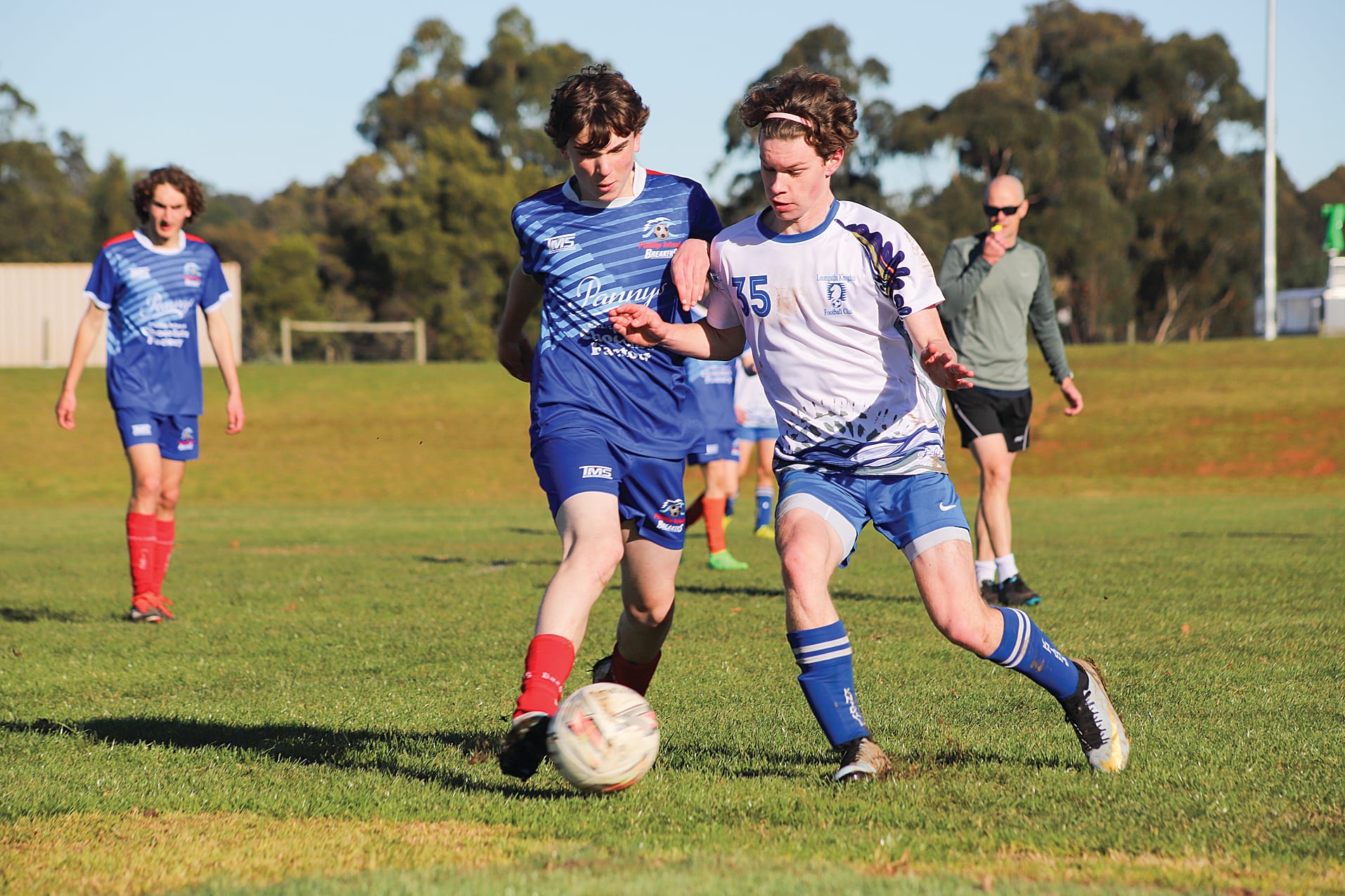 U17s Goal Scorer Patch Wilson takes on his Phillip Island opponent. 