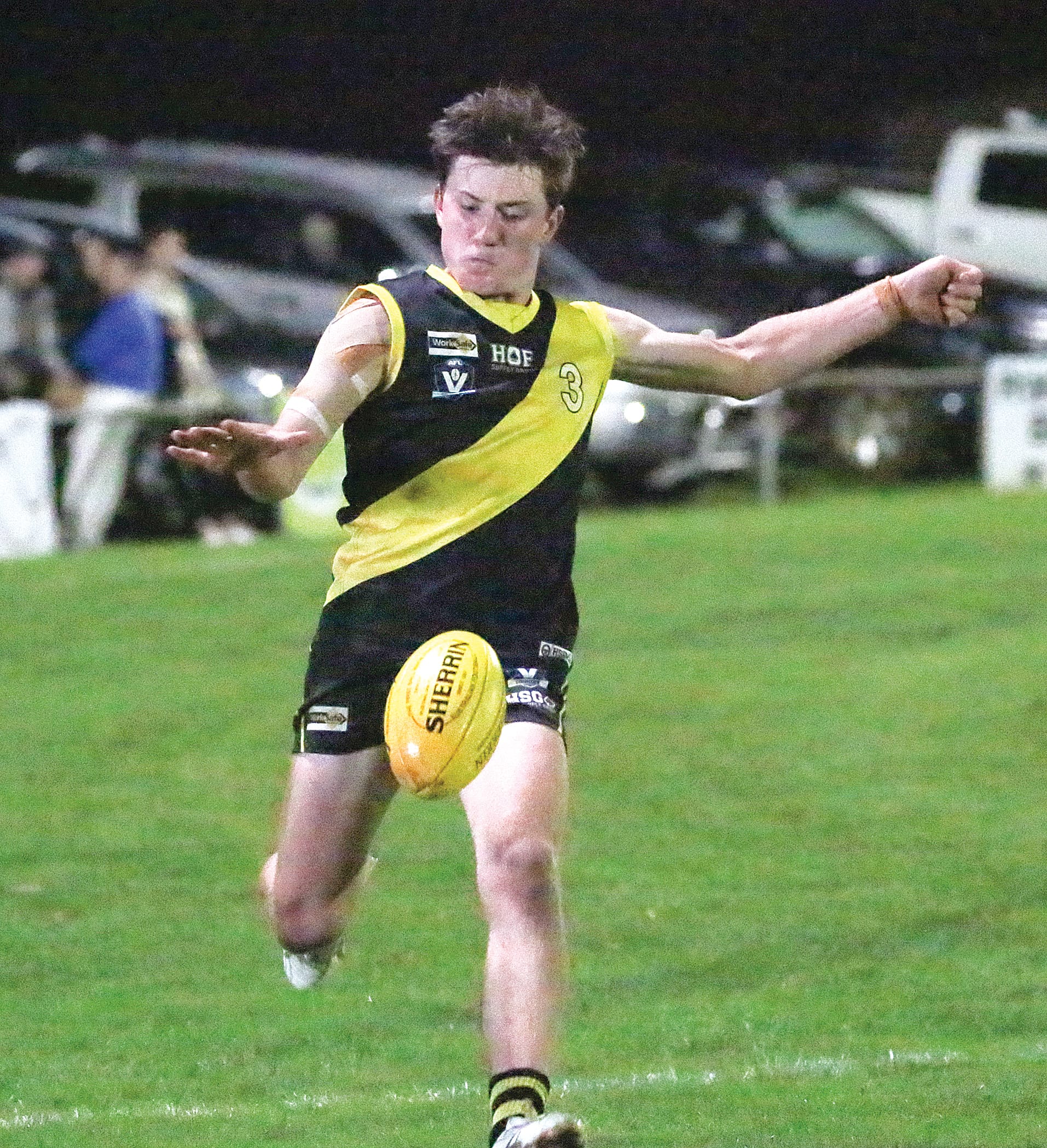 Ethan Woodall boots the ball towards the goal for Mirboo North.