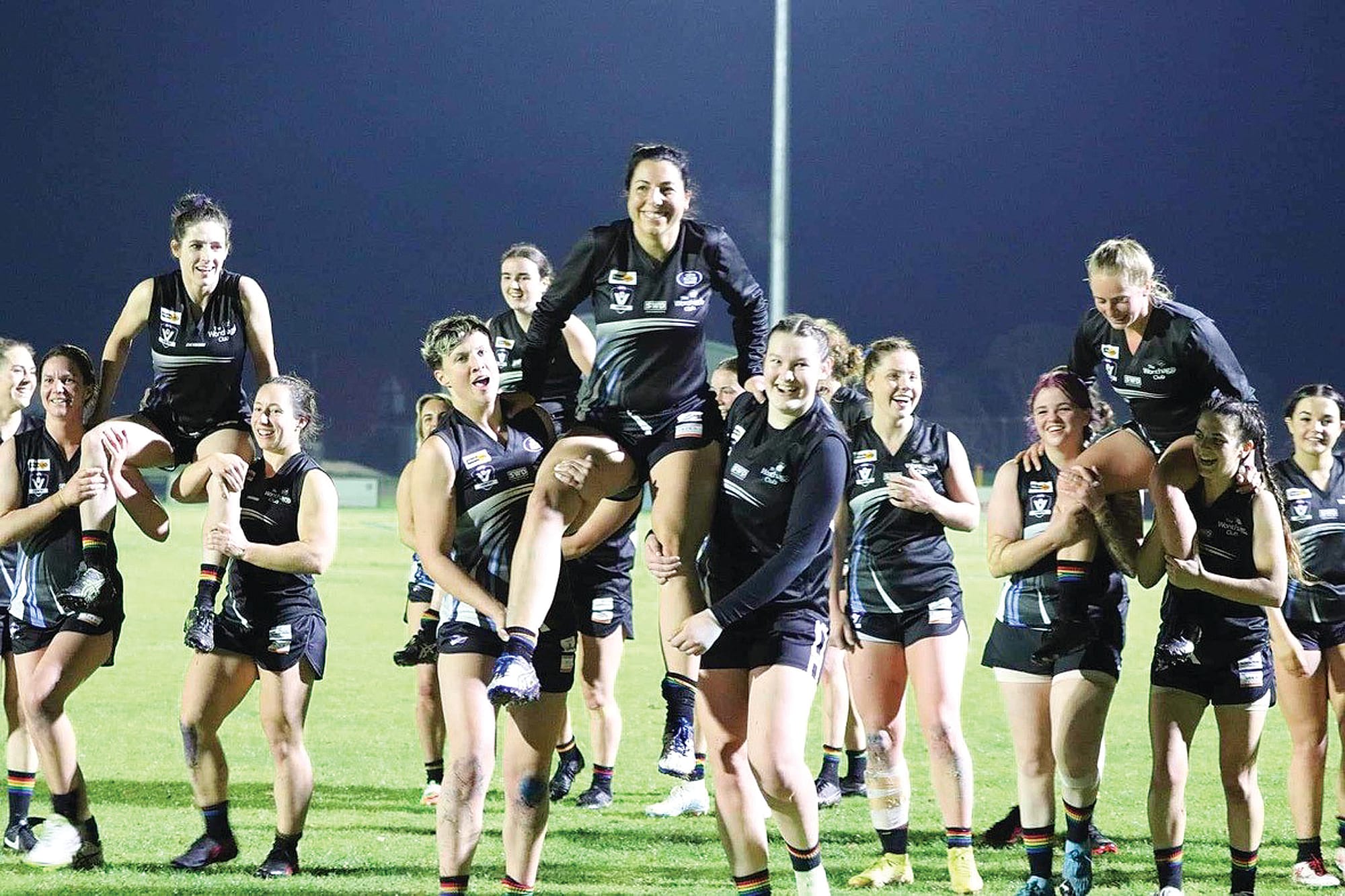 The milestone game players were chaired off by their proud teammates. 