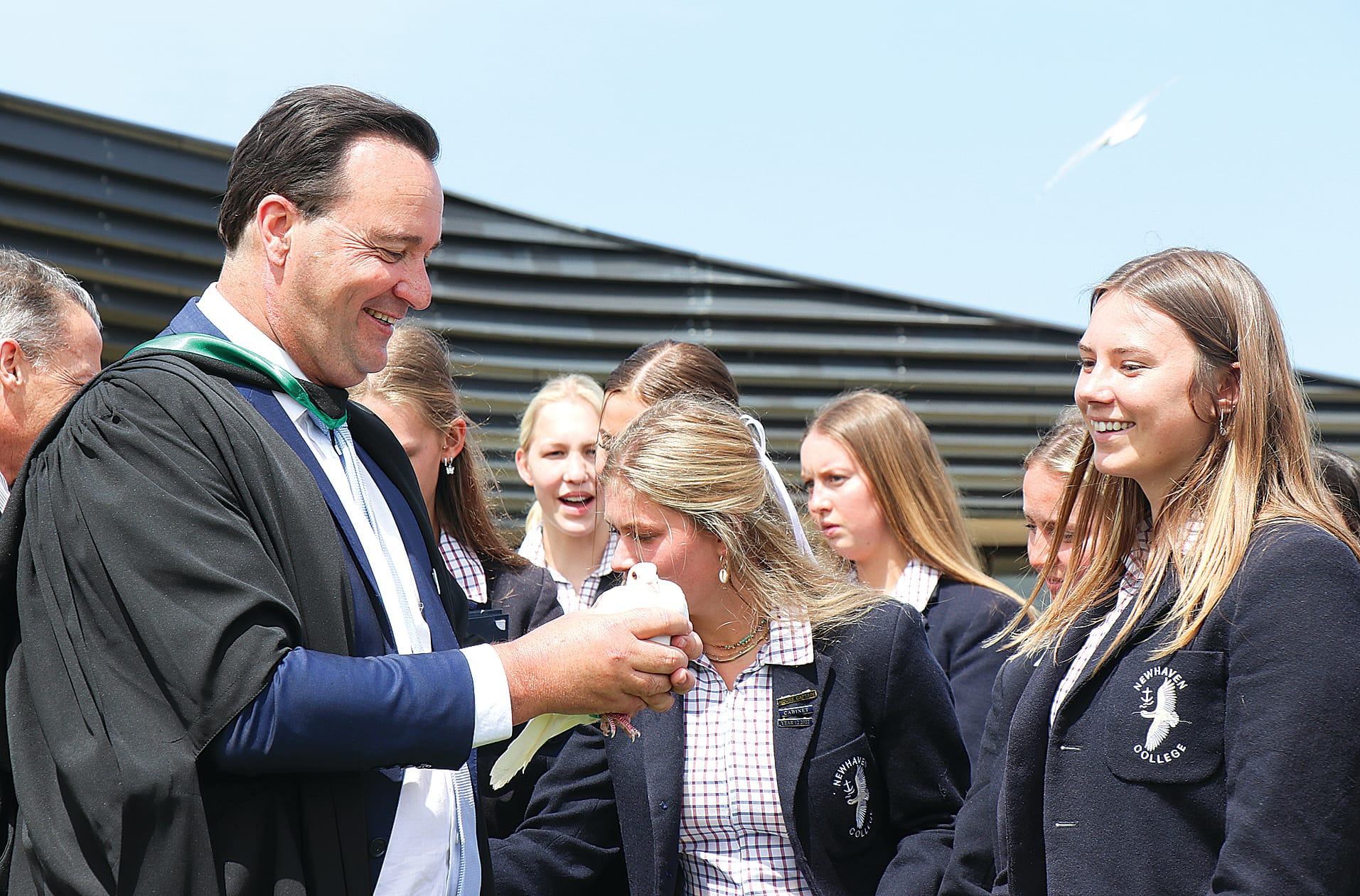 Newhaven College principal Tony Corr celebrates the class of 2022 with the release of the white doves at the Year 12 graduation ceremony. Z02_4223