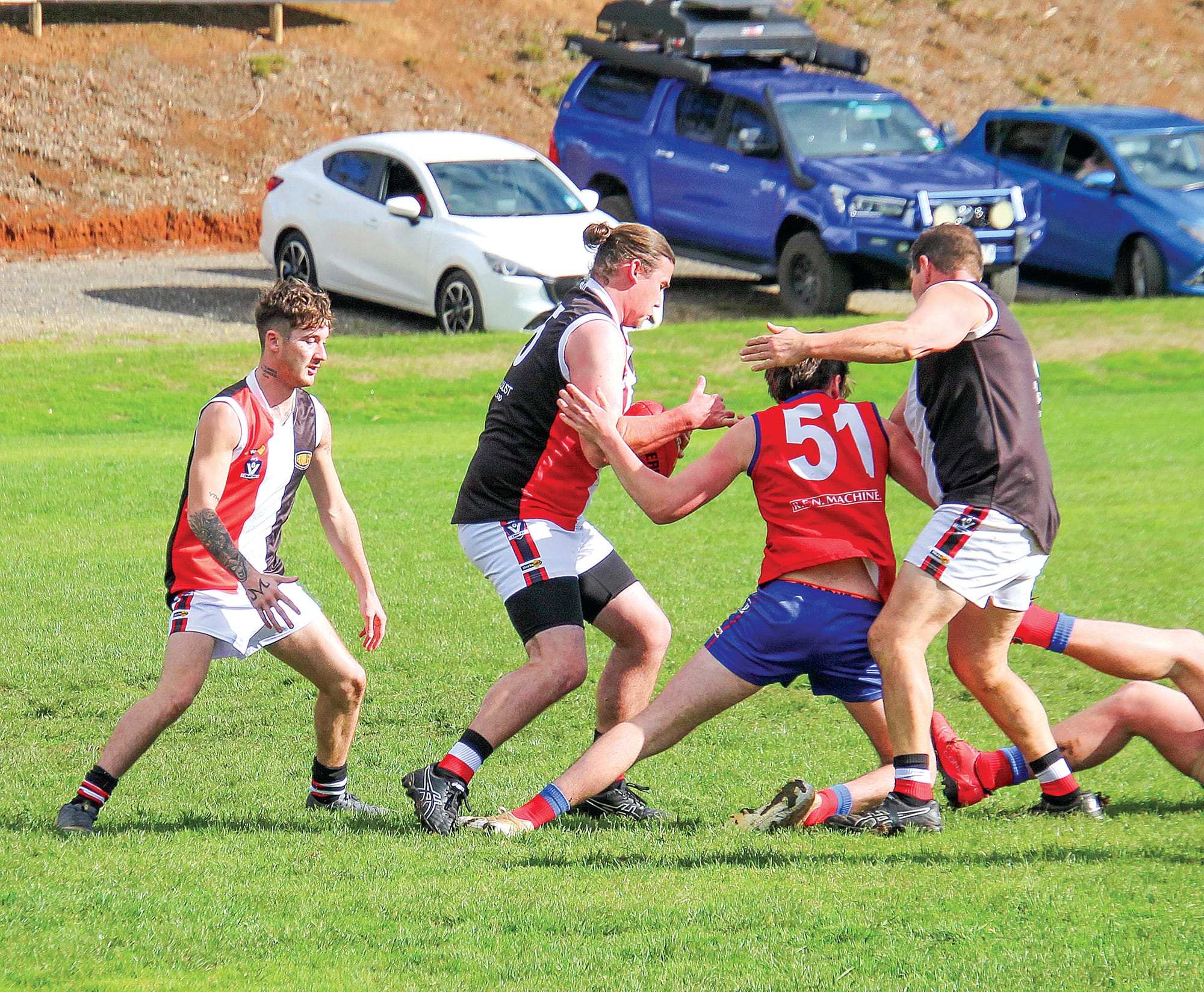 Riley Browne clears the ball for Nyora. 