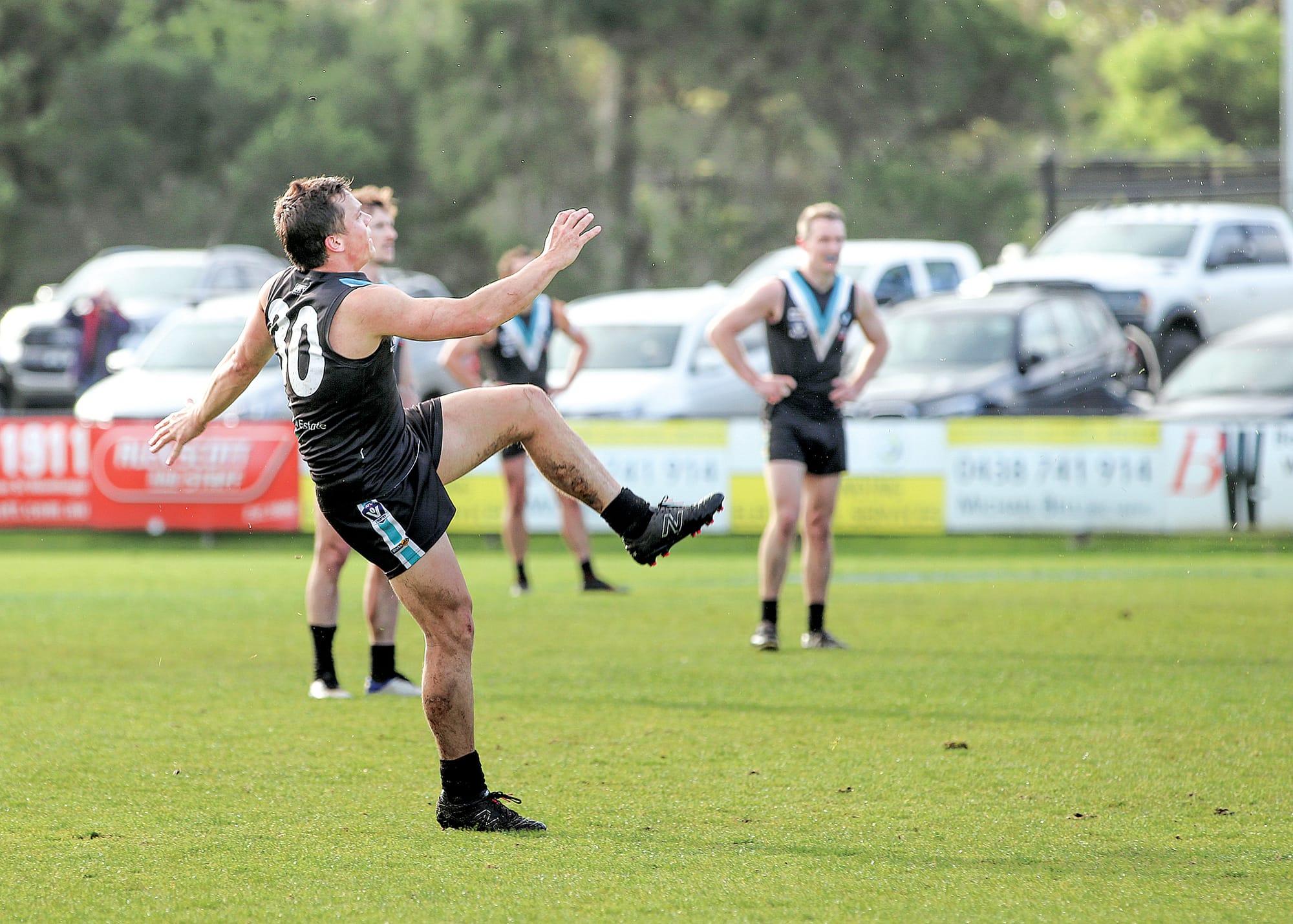 Mitch Hayes sends the ball straight through for goal, maintaining a heavy lead against Moe in the second half. Z44_3422