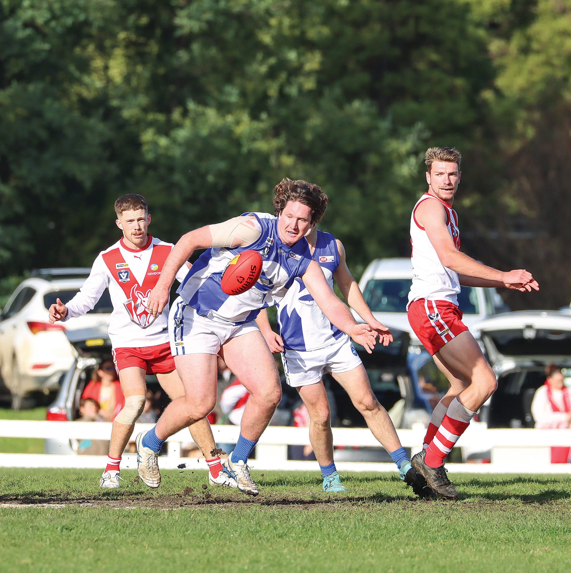 Tarwin’s Harrison Cumming pursues the Sherrin, being one of the Sharks’ better players against Fish Creek. A43_2825