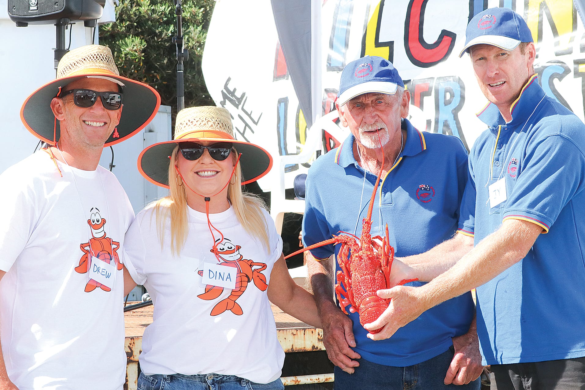 Volunteers Drew, Dina, Frosty and Jy giving away the San Remo Co-Op lobsters as part of the spinning wheel prize. Z17_0524 