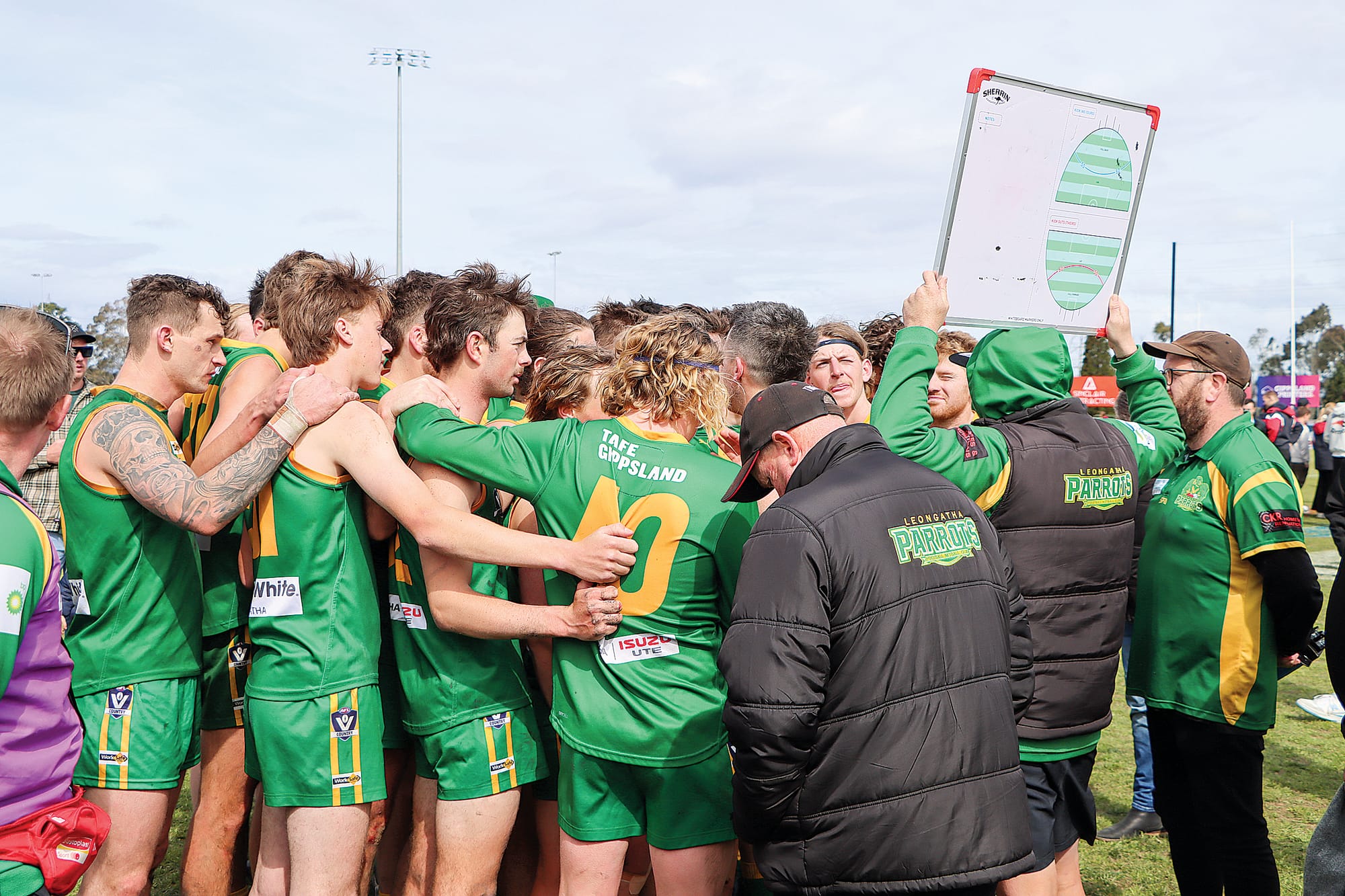 Leongatha Reserves players listen to instructions during the club’s third premiership in a row. A50_3924