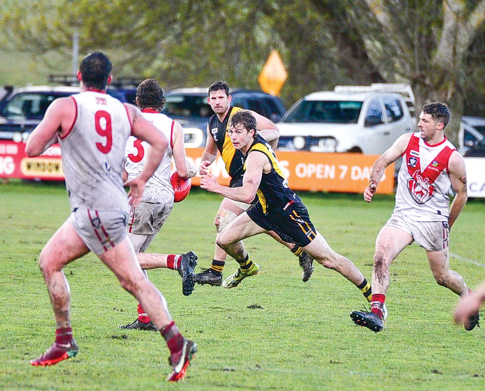 Fish Creek and Foster compete fiercely for the footy, the Tigers coming out on top by 18 points.