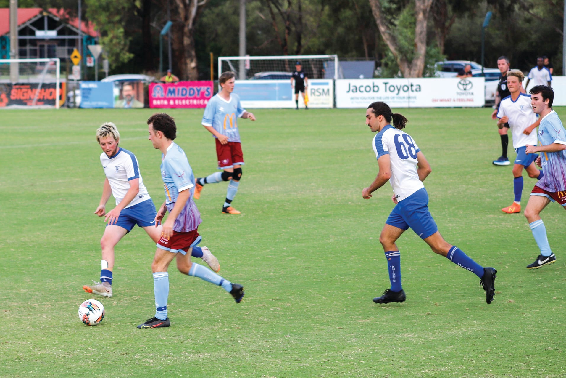 Leongatha Knights defender Jack Bainbridge shuts down his Twin City opponent. 
