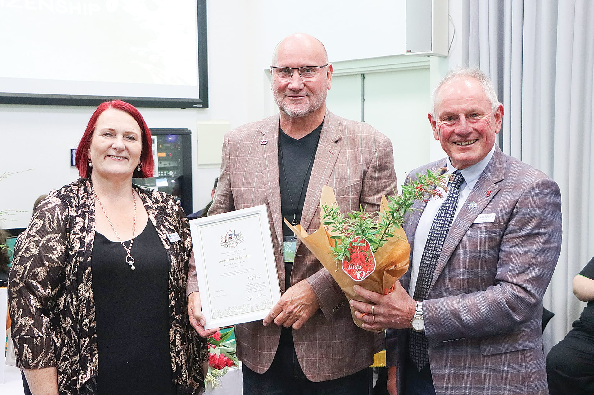 Kenneth Dixon is acknowledged as an Australian citizen by Cr Bron Beach and Mayor John Schelling. A02_1725