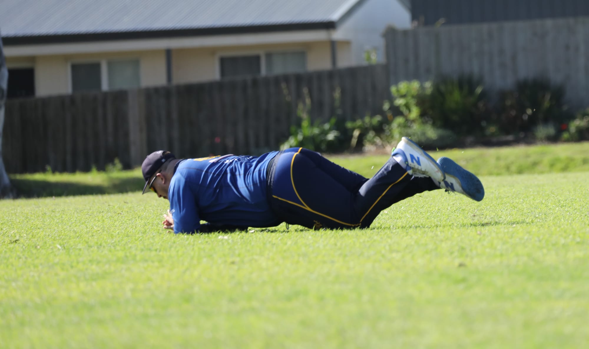 Heath Dobbie dives in for the catch but is unsuccessful.
