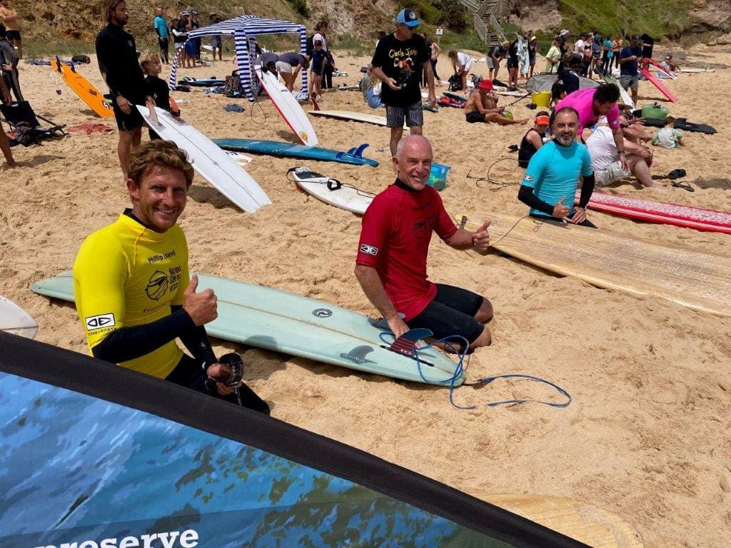 Dylan James, Graham Bergen and Geoff Russell wait for their PIBC Teams Challenge longboard final to come up.
