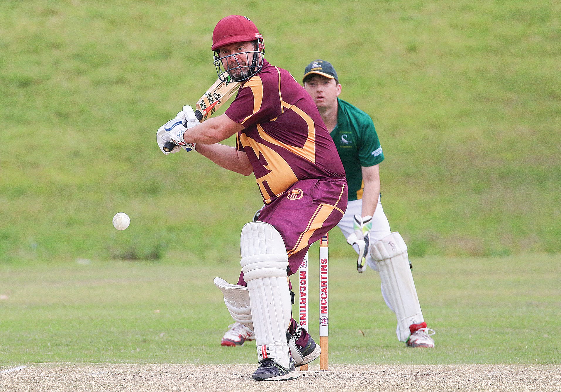 OMK’s Mitch Nicholas awaits delivery as Town wicketkeeper Davern Goss watches on.