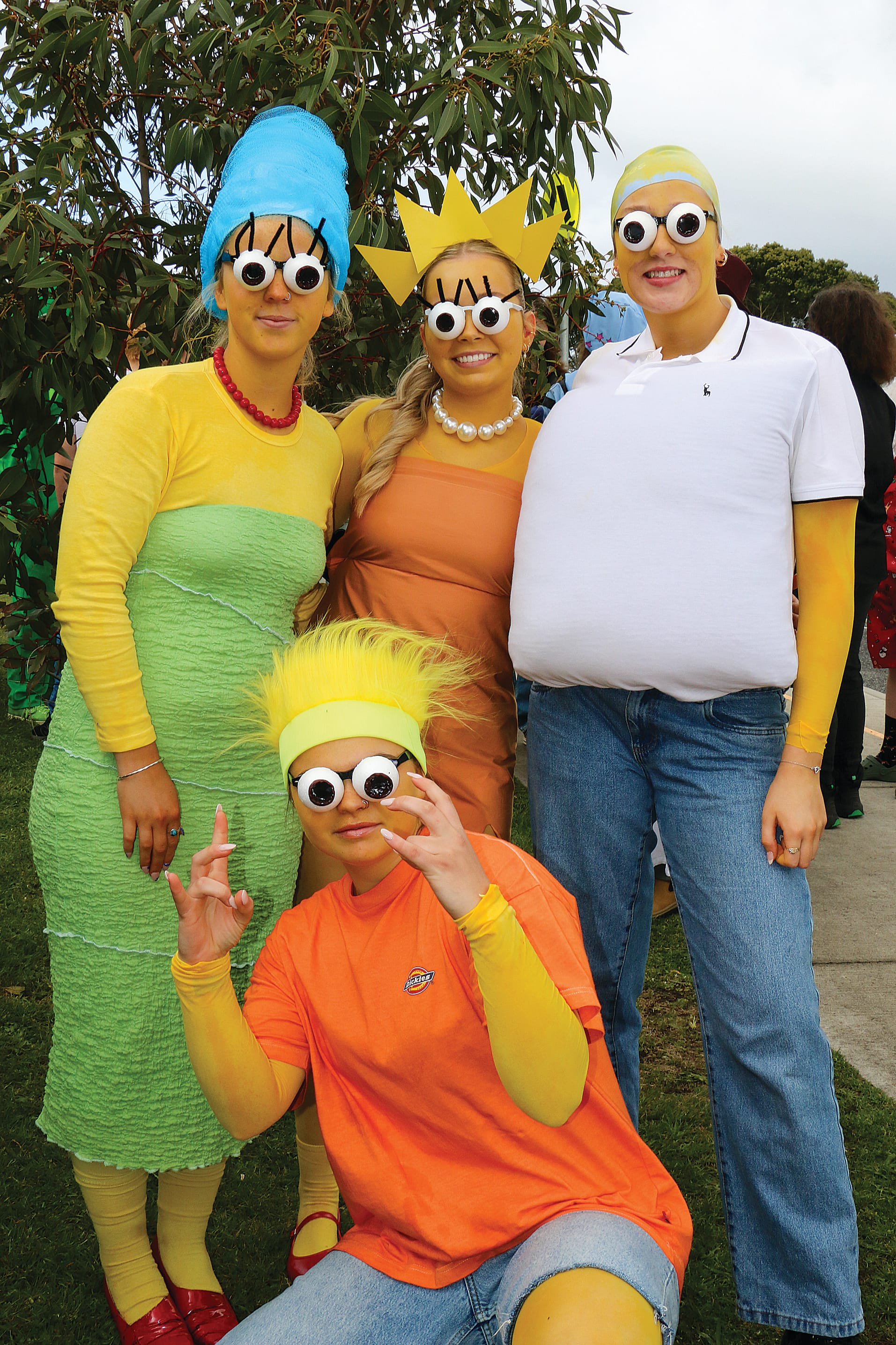 Imogen Lockhart, Eliza Wintle, Ash Cato and Jaycee Trewavis (front) dressed as the Simpsons family for Celebration Day at Bass Coast College. Tk18_4424