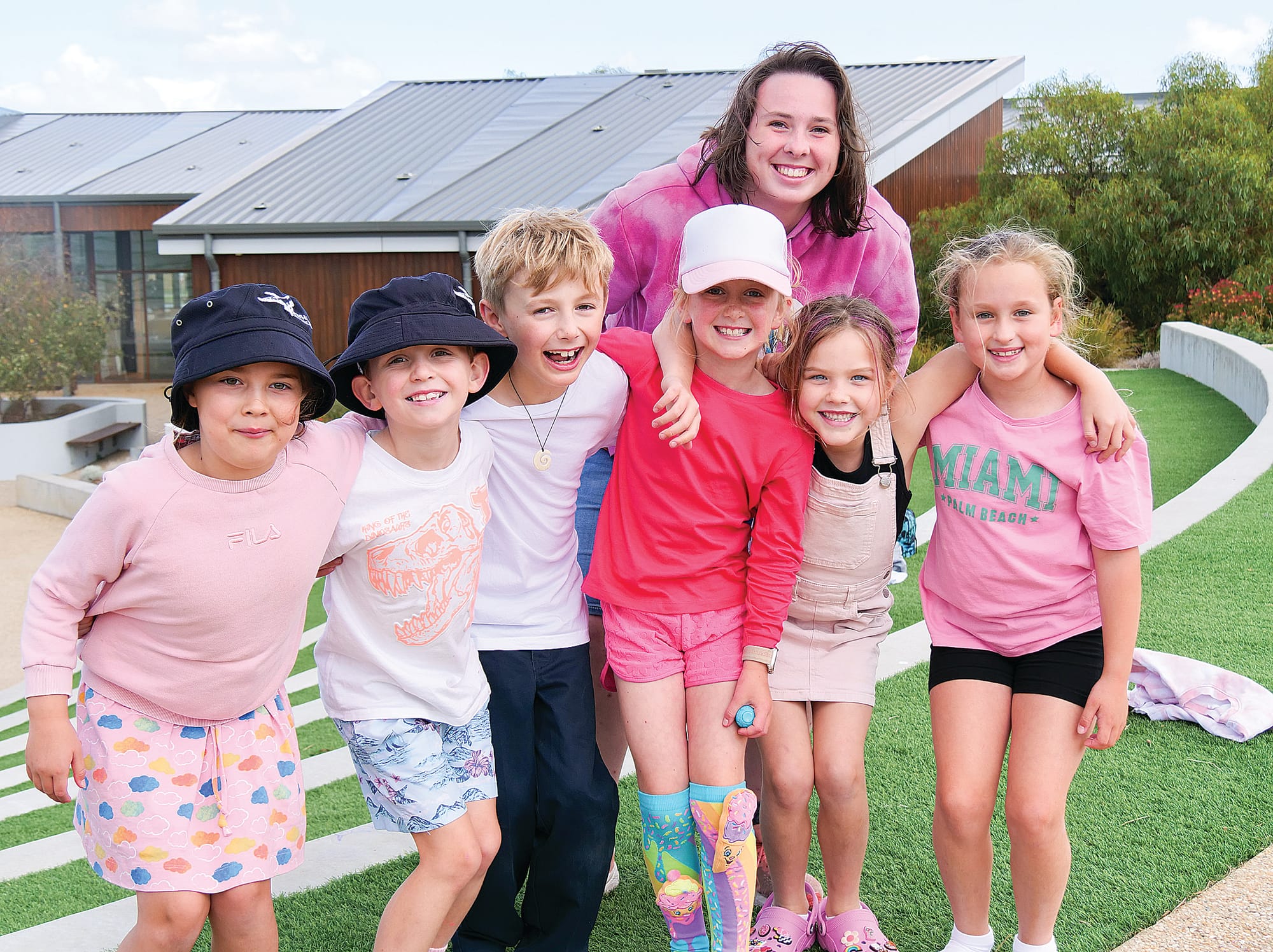 Year 12 student Kiera Rowe was impressed with the pink outfits worn by Year 2 students Mieka Gale, Benji Ellery, Oscar Wright, Harley Filsell, Eden Bennett and Sophie Phillips.