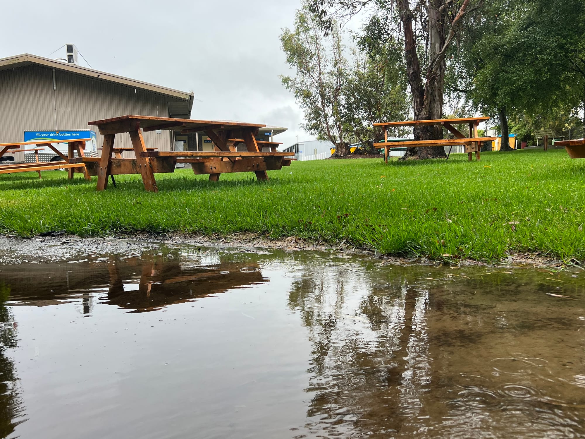 The impact of Monday's heavy rainfall at Stony Creek Racecourse is apparent in the picnic area near the playground.