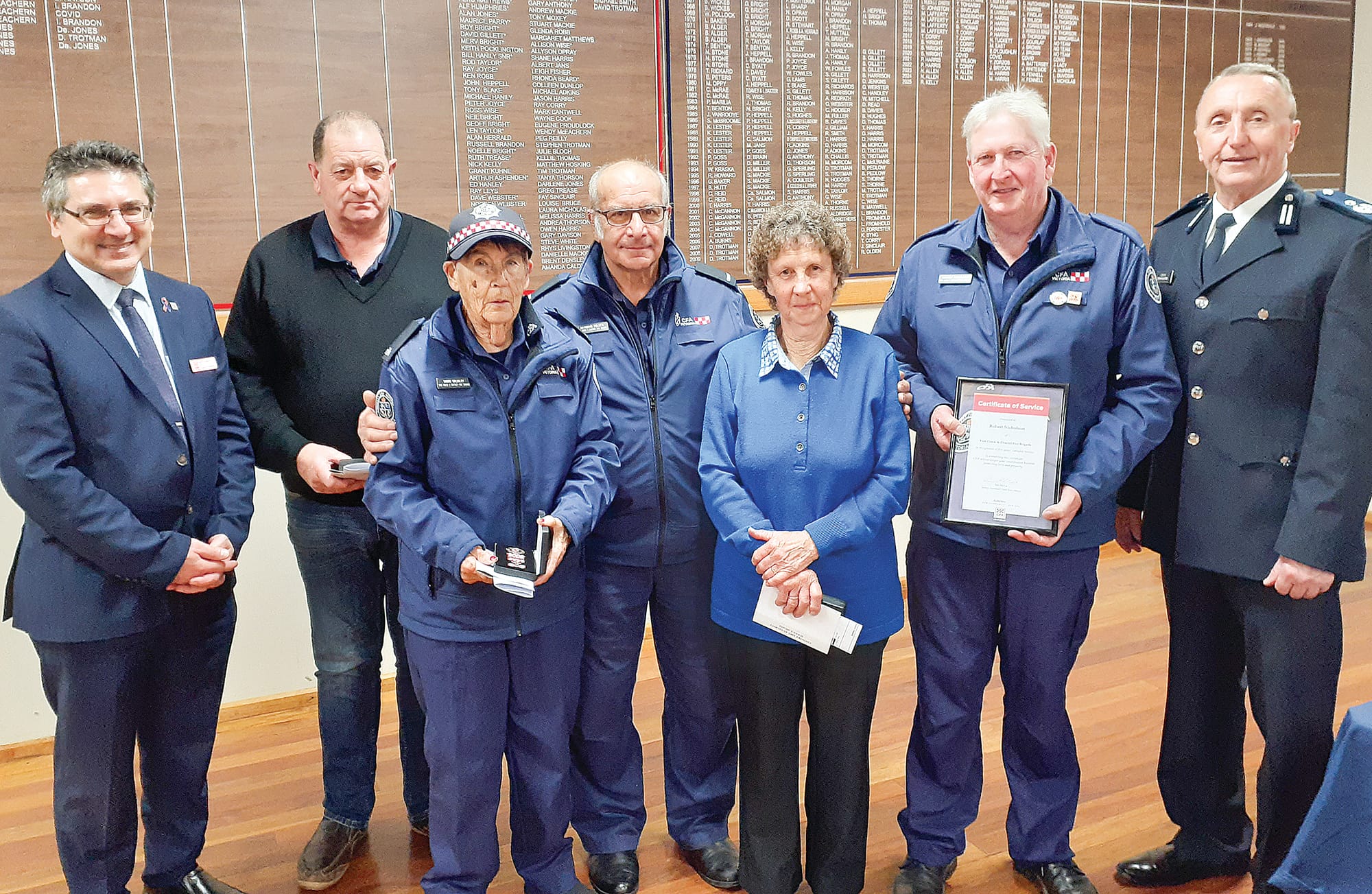 Fish Creek & District recipients included, second from left, Gordon Pulham, who collected his father Neville Pulham’s 70 year medal, Marg Grumley (35 years), Captain Ray Poletti, Glenys Thompson (15 years) and Rob Nicholson (5 years), with CFO Sam Costanzo and Commander Andrew McCartney.